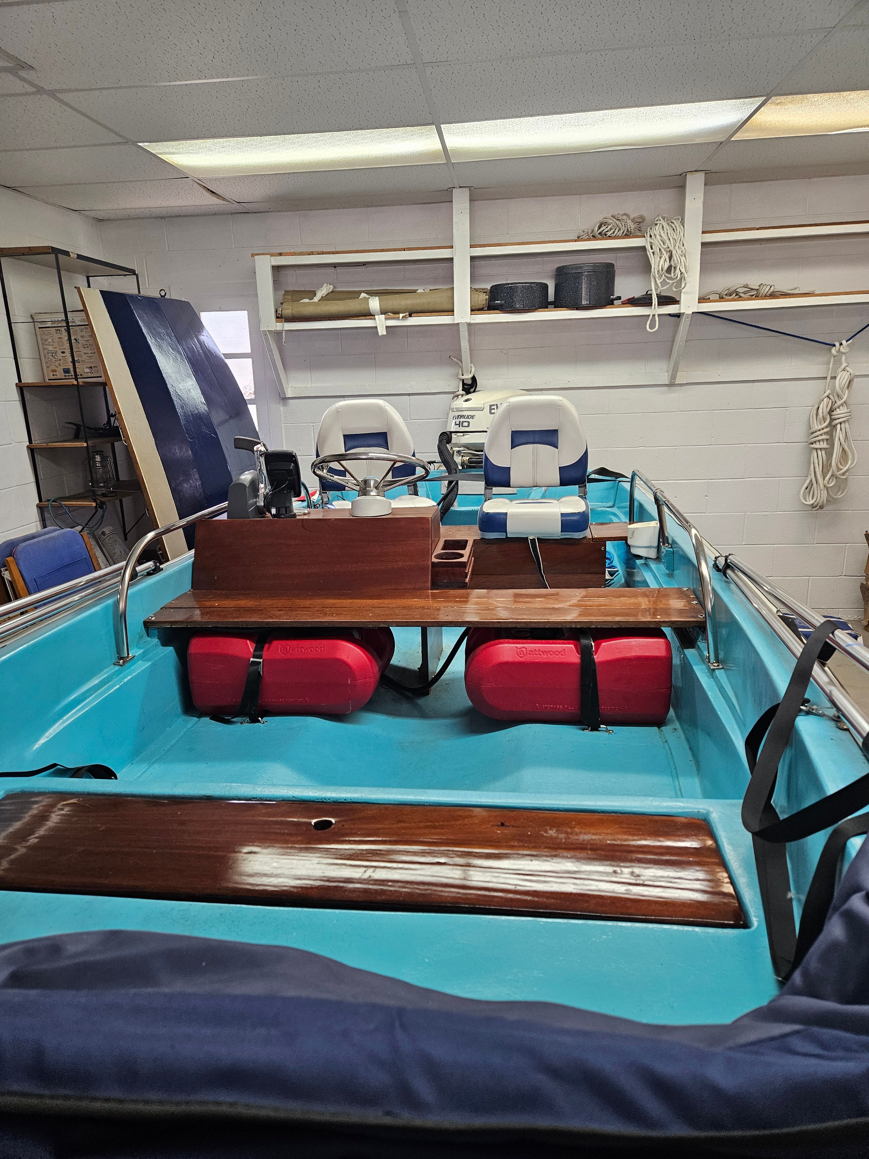 Interior view of a restored 1977 Boston Whaler 14 boat.