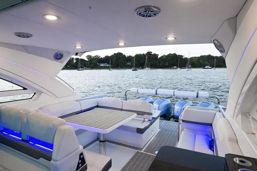 Luxurious 2020 Formula 400 Super Sport Crossover yacht interior with scenic waterfront view.