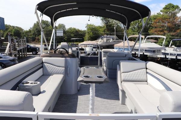 2024 Bennington 21 SSR pontoon boat with spacious seating and canopy.