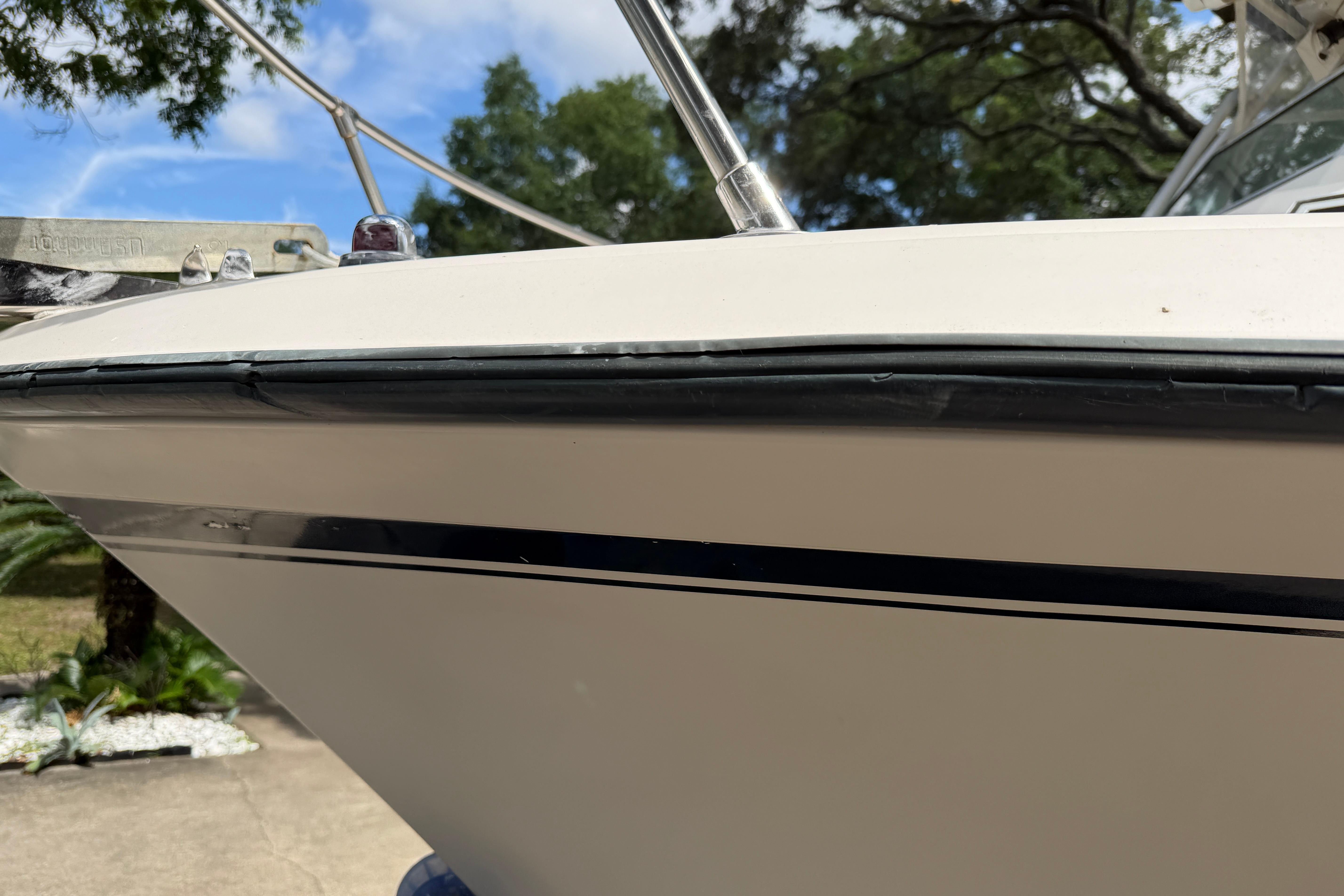 1987 Grady-White Seafarer 226 boat bow detail with sleek design and outdoor setting.
