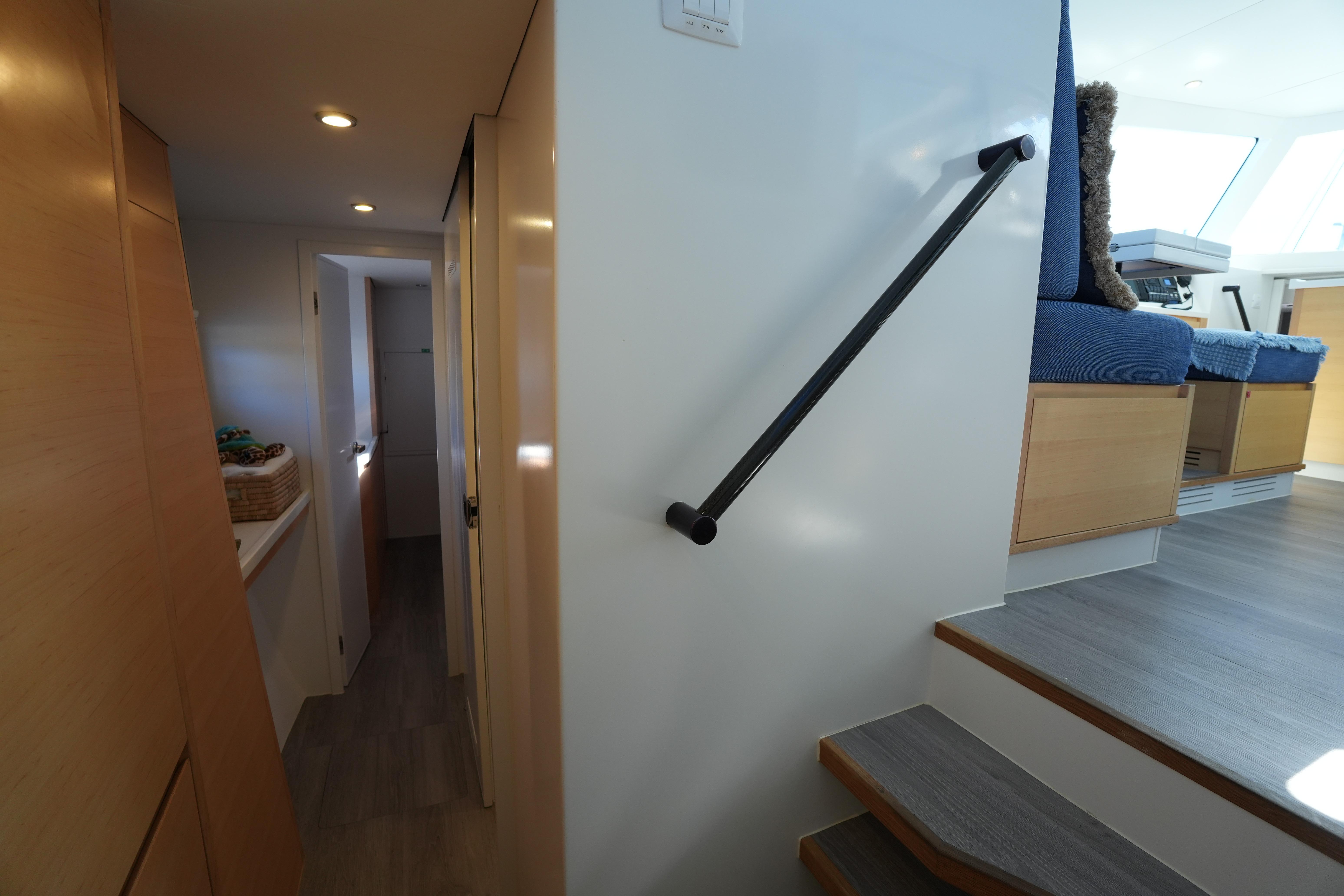 Interior of 2024 Balance 442 yacht, featuring modern design and cozy seating area.