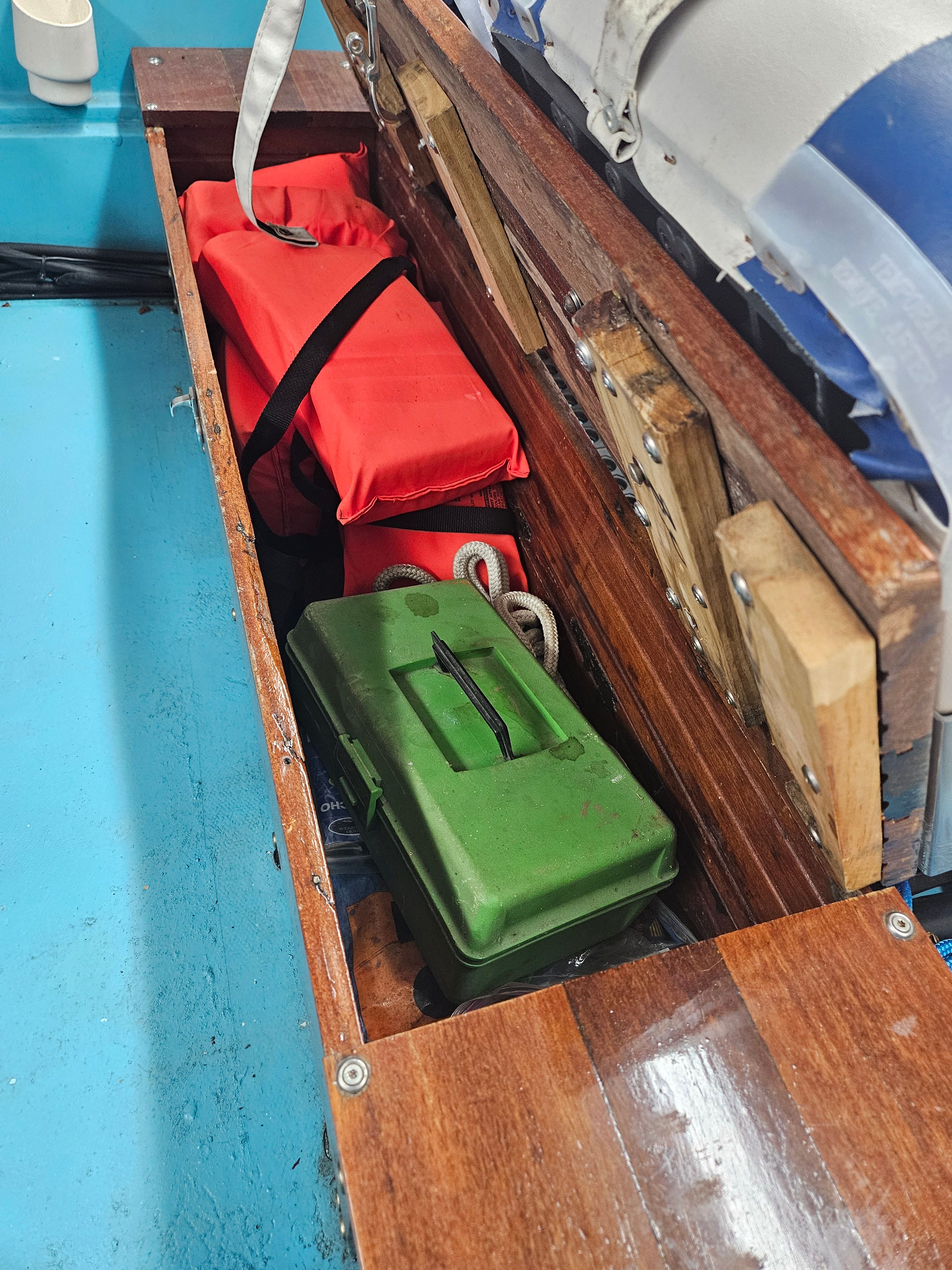 Storage compartment in a 1977 Boston Whaler 14 boat.