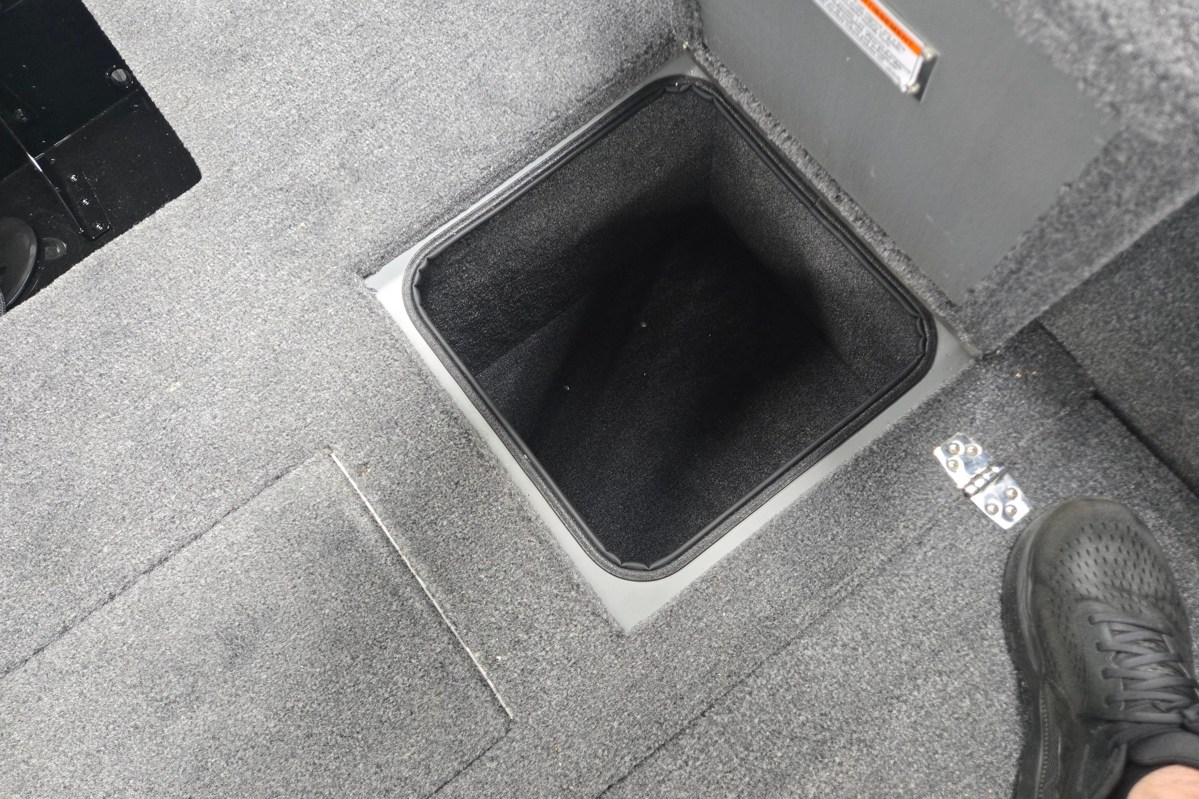 Storage compartment in 2026 Princecraft Sport 175 MAX boat, featuring carpeted interior.