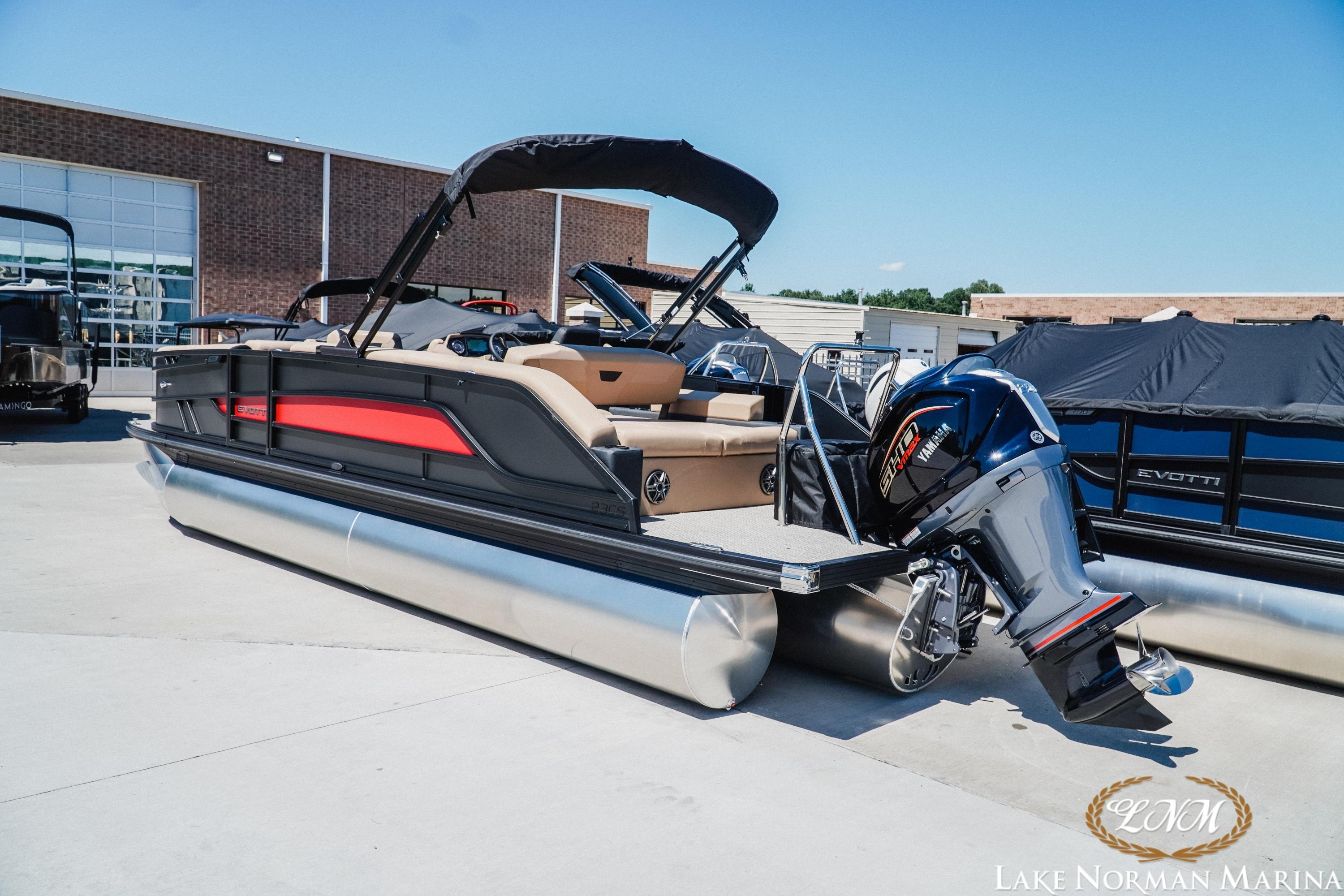 2026 Evotti 523CS pontoon boat with Yamaha engine at Lake Norman Marina.