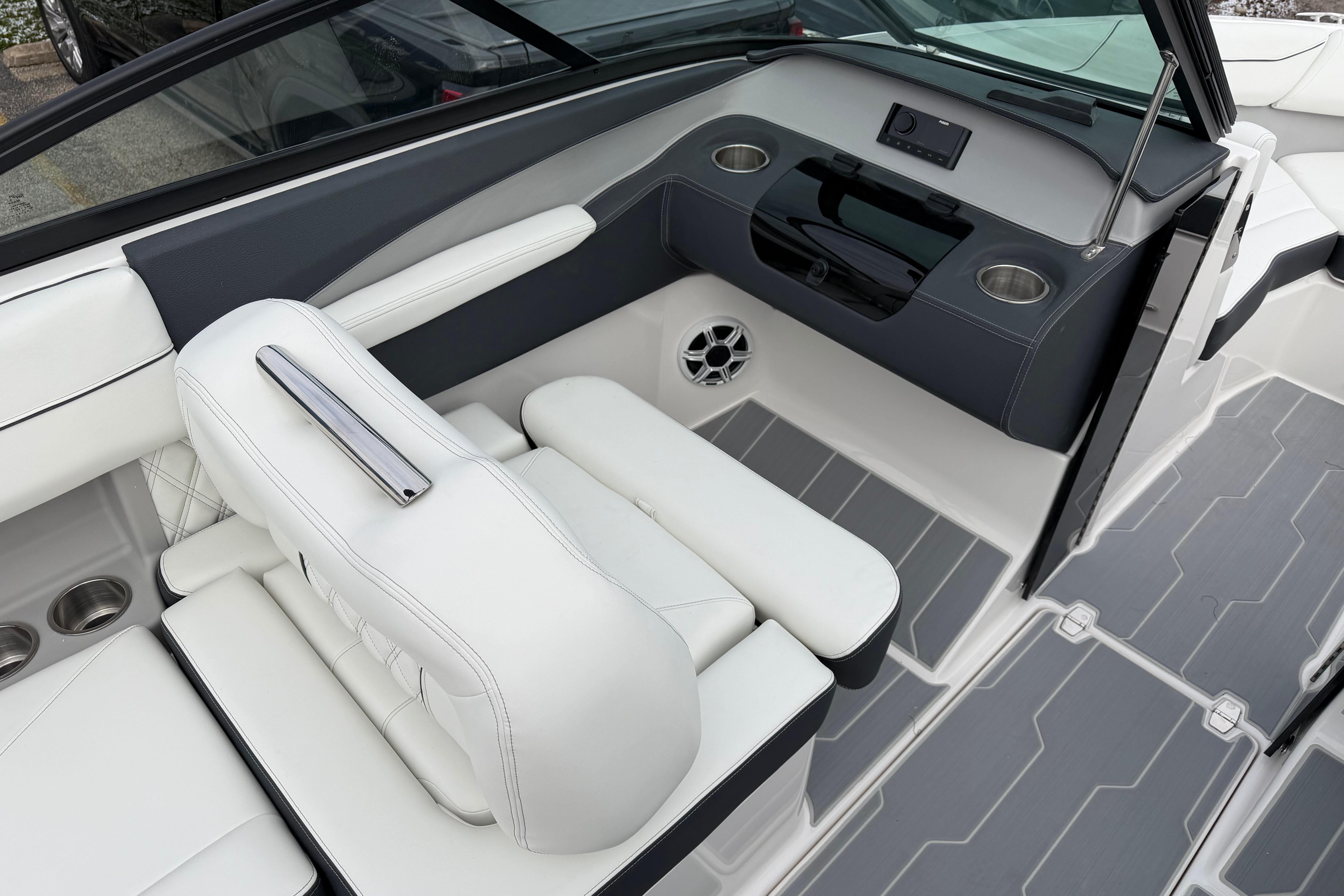 Luxurious interior of 2026 Regal LS2 Surf boat with sleek seating and modern design.