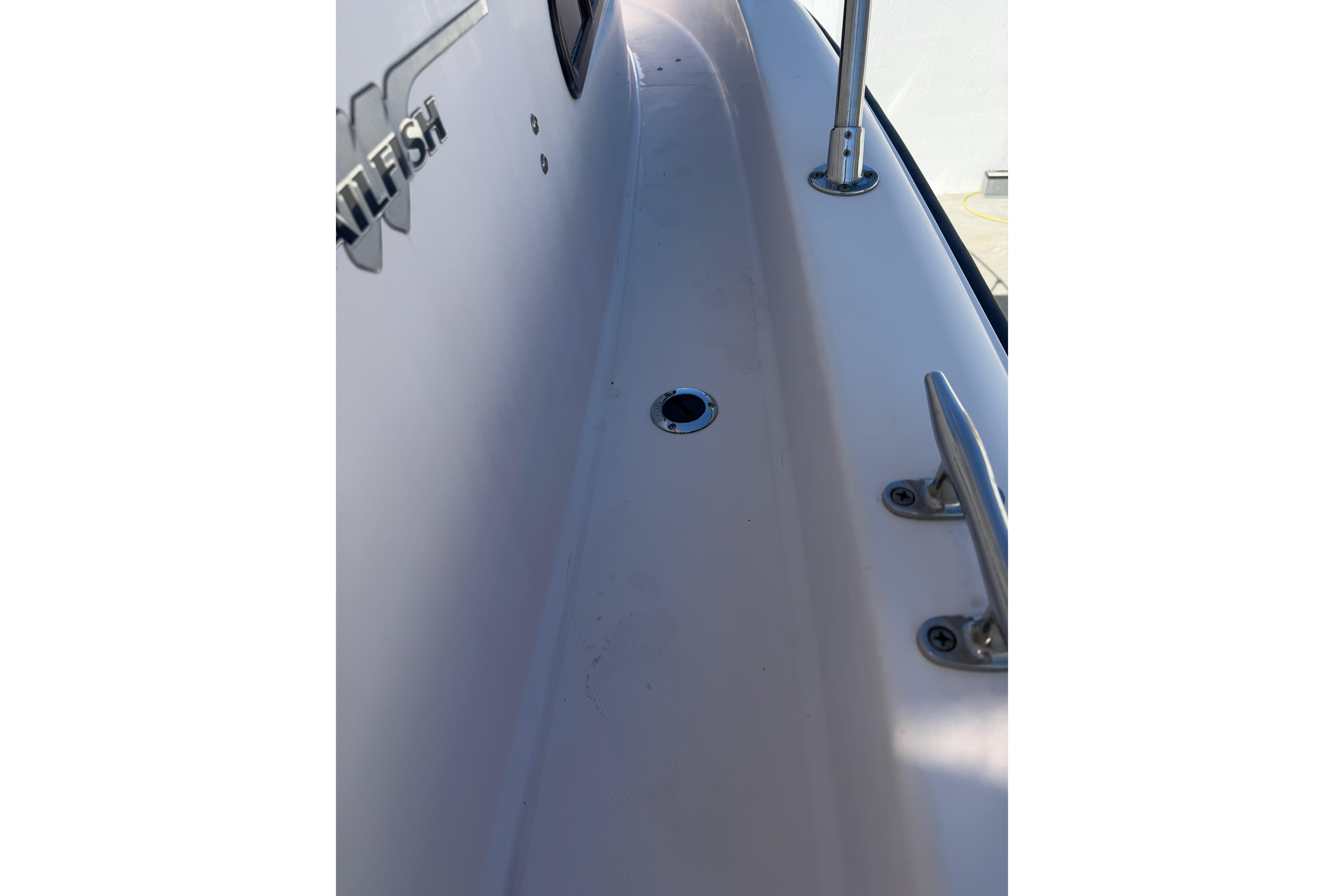 2006 Grady-White Sailfish 282 boat deck with cleat and railing detail.