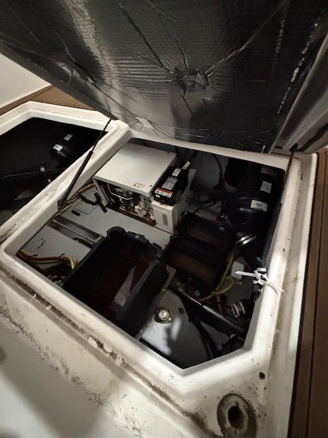 Engine compartment of a 2004 Meridian 341 Sedan boat.
