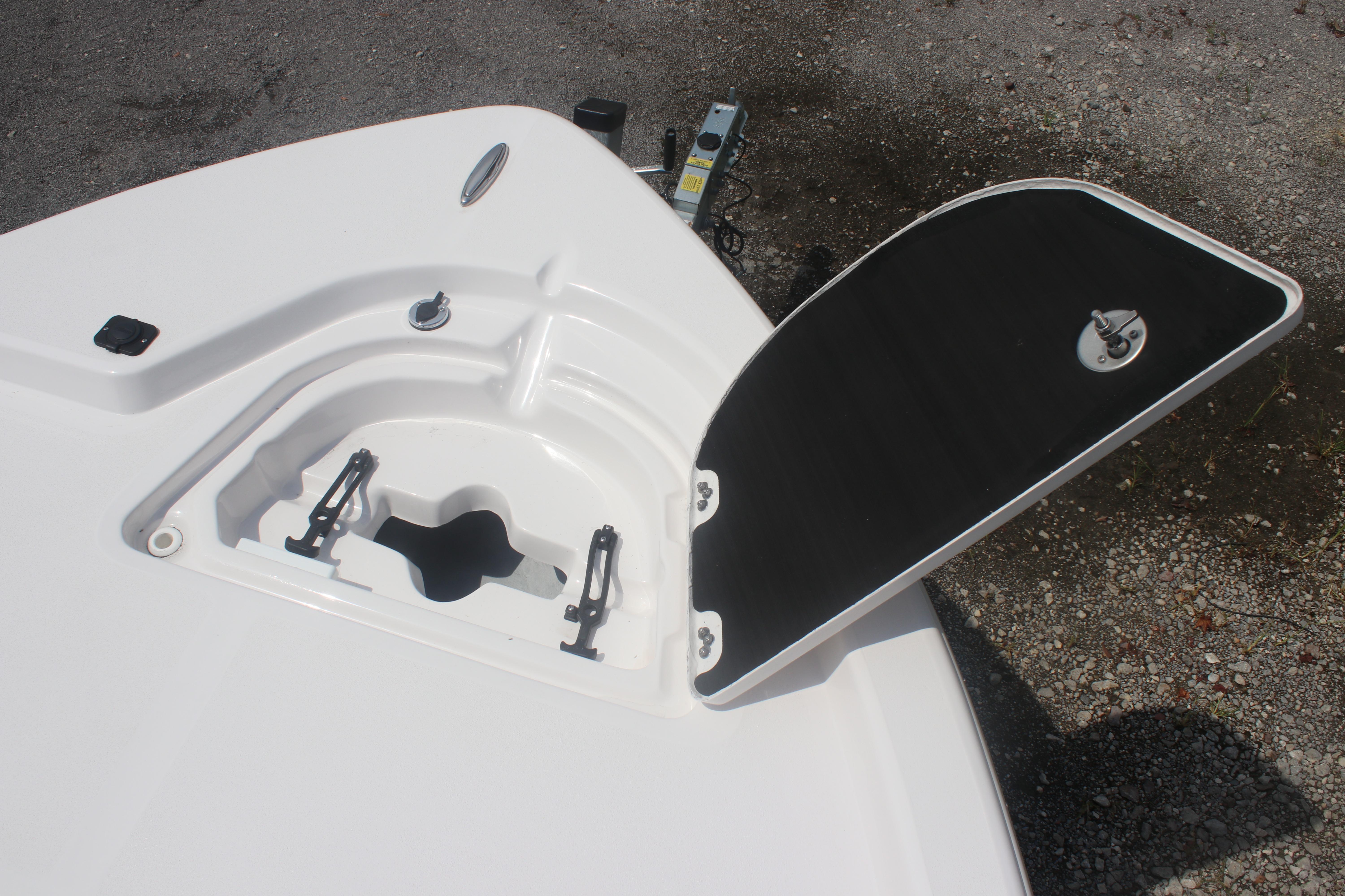 2025 Sea Fox 231 Bay Fox boat hatch open, showcasing storage compartment.