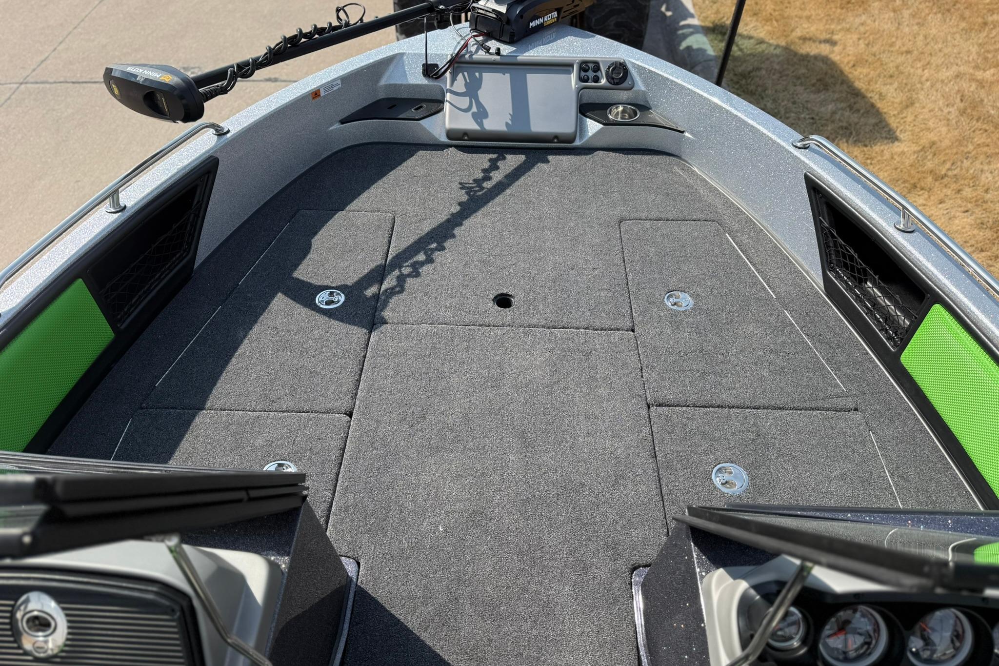 2026 Ranger 1880MS boat deck with carpeted surface and storage compartments.