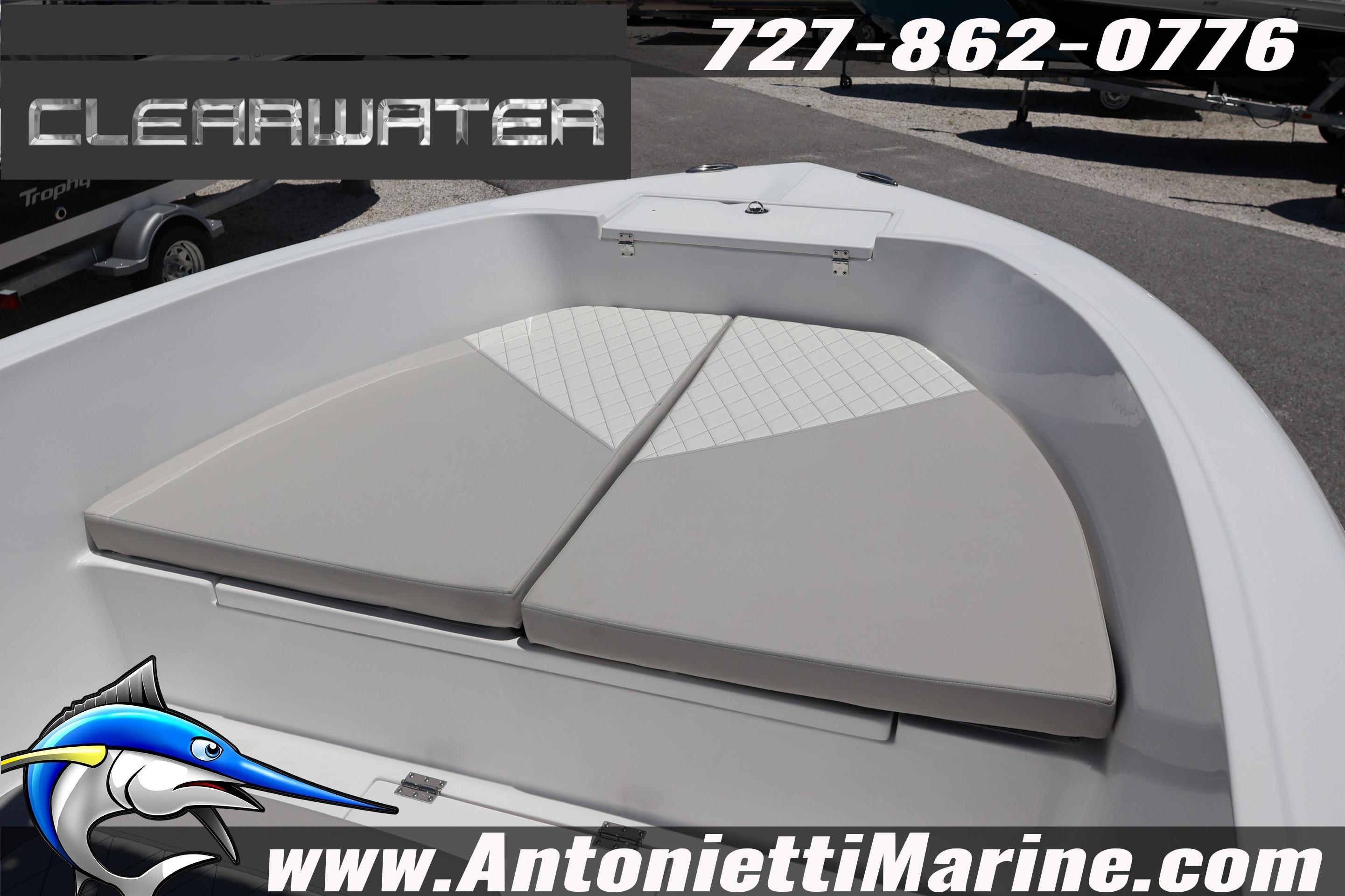 2026 Clearwater 2000 Center Console boat with cushioned seating, contact info, and website displayed.