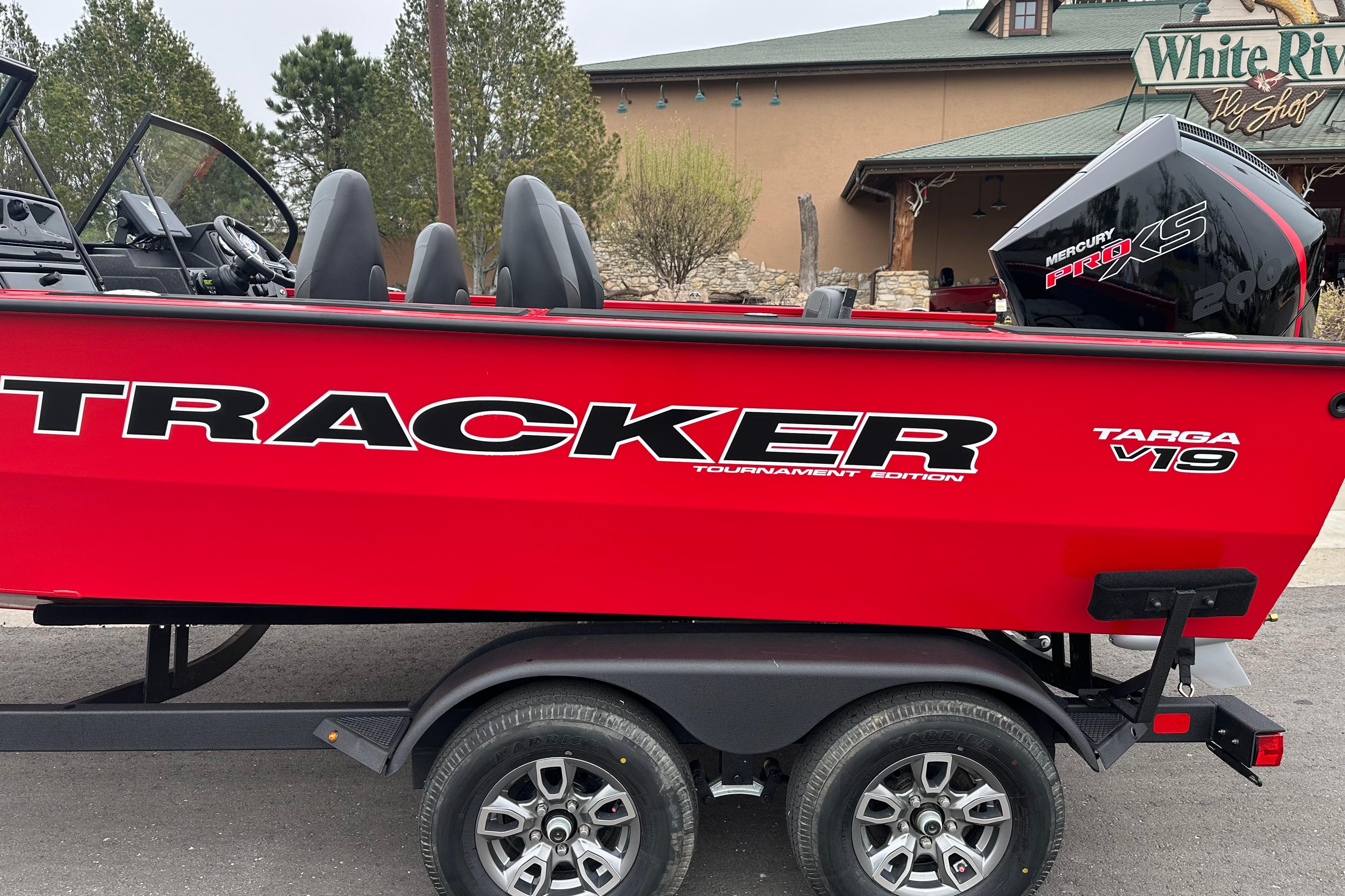 2026 Tracker Targa V-19 Combo boat with Mercury Pro XS engine, parked near White River Fly Shop.