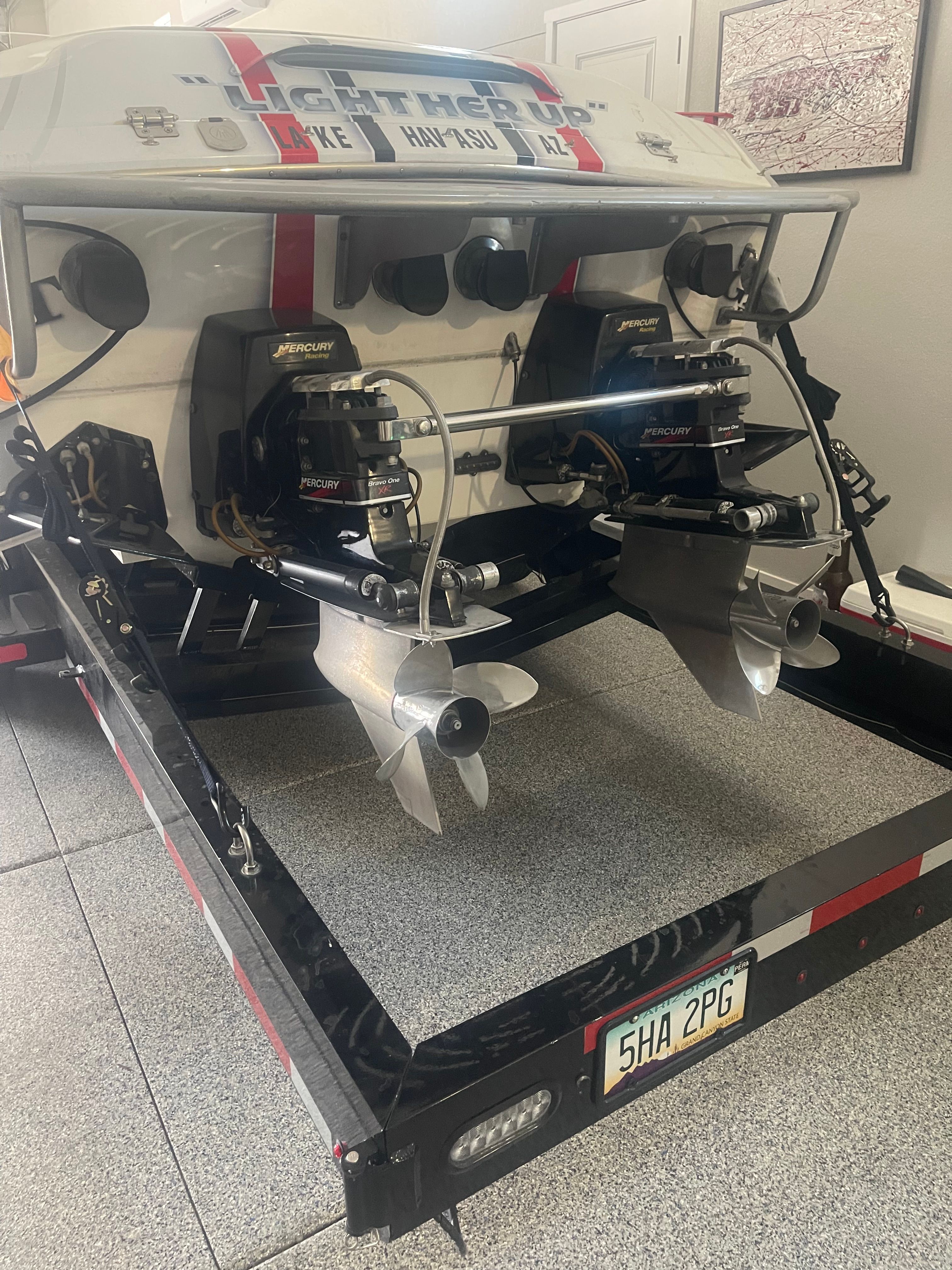 Rear view of a 2004 Cigarette 38' Top Gun boat with Mercury engines.