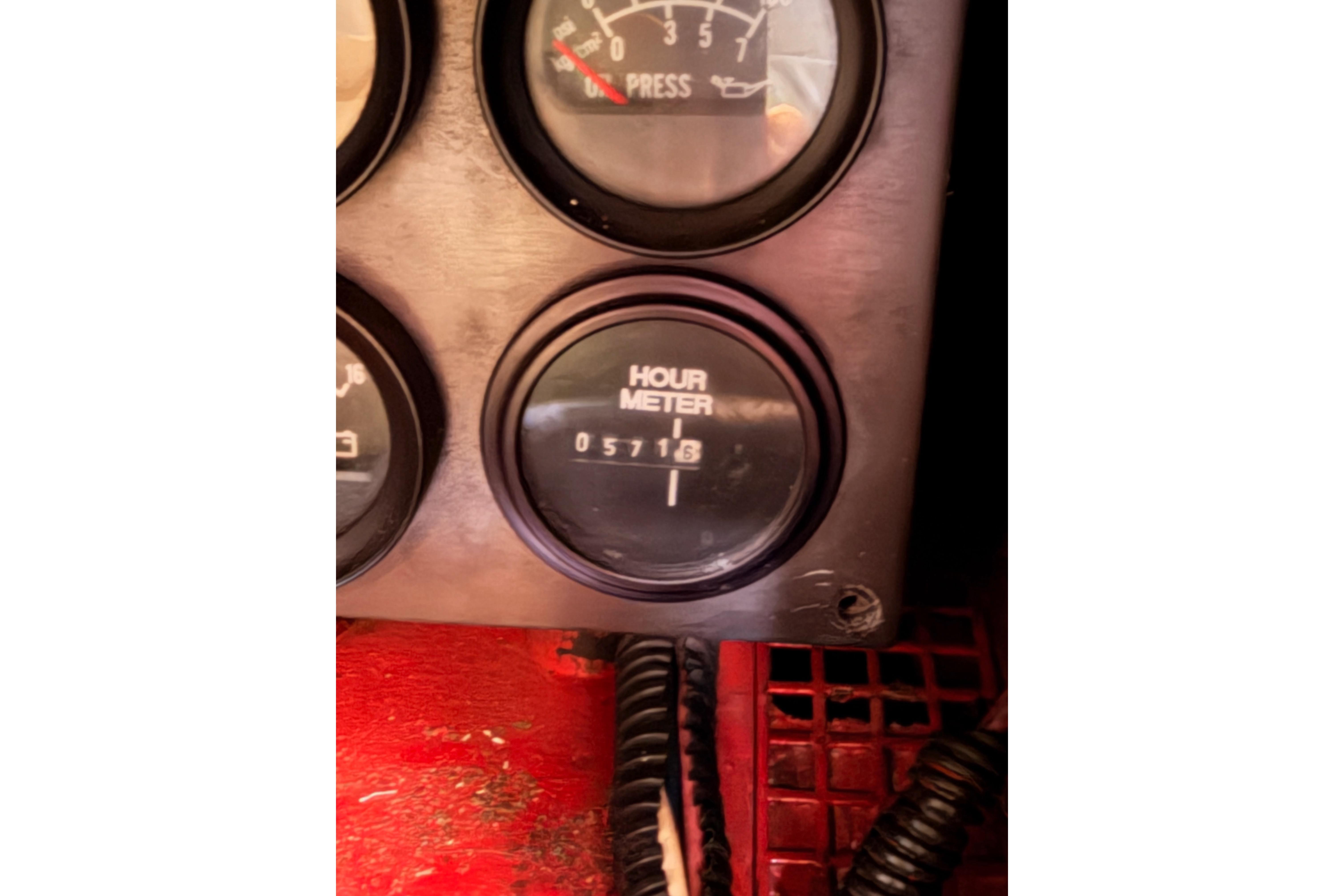 Hour meter reading 5718 on a 1991 Hylas 51 dashboard.