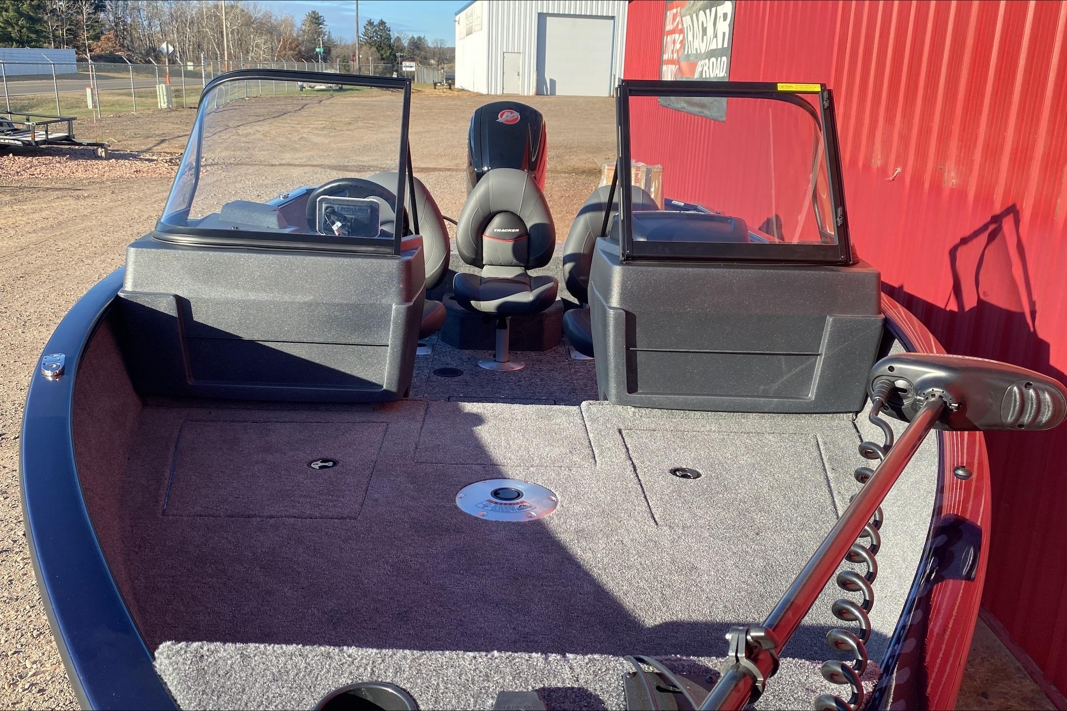 2026 Tracker Pro Guide V-175 WT boat interior with seating and windshield.