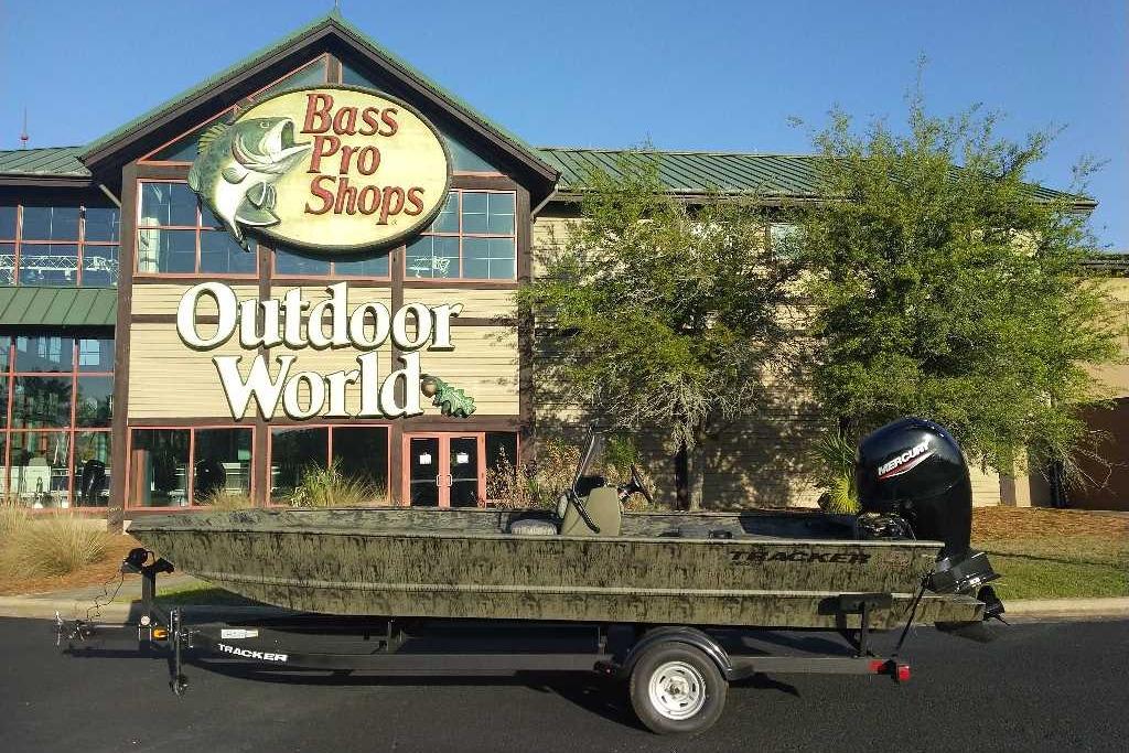 2026 Tracker Grizzly 2072 CC boat outside Bass Pro Shops Outdoor World.