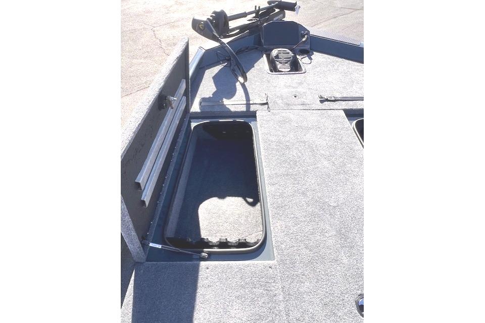 Ranger RT188P 2026 boat with open storage compartment.