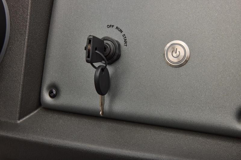 Ignition switch and power button on 2026 Sun Tracker Party Barge 22 DLX dashboard.