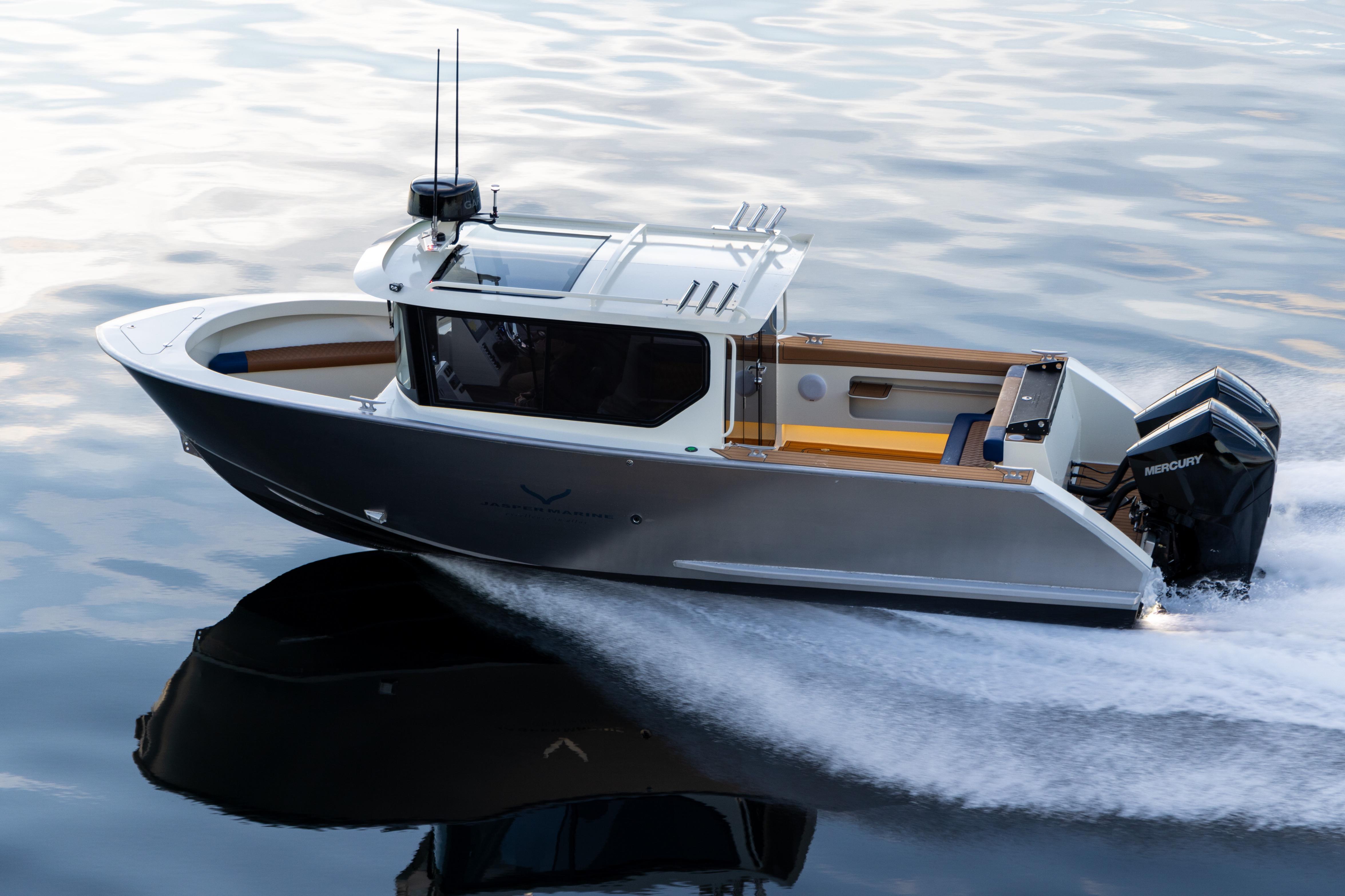 2026 Jasper Marine Defender 22 boat cruising on water, featuring sleek design and powerful Mercury engines.