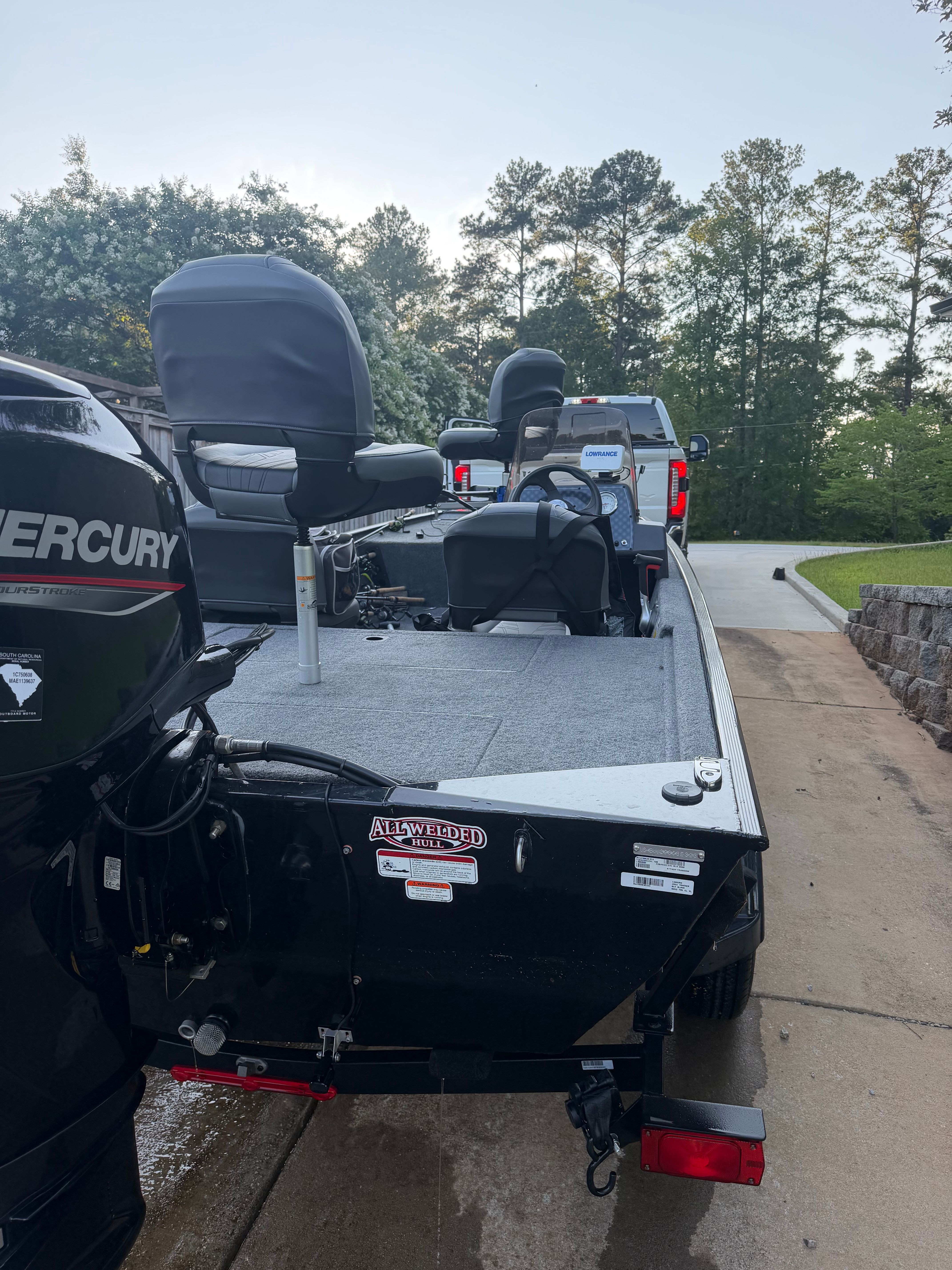 A 2023 Bass Tracker Classic XL on a trailer, featuring a Mercury outboard motor.