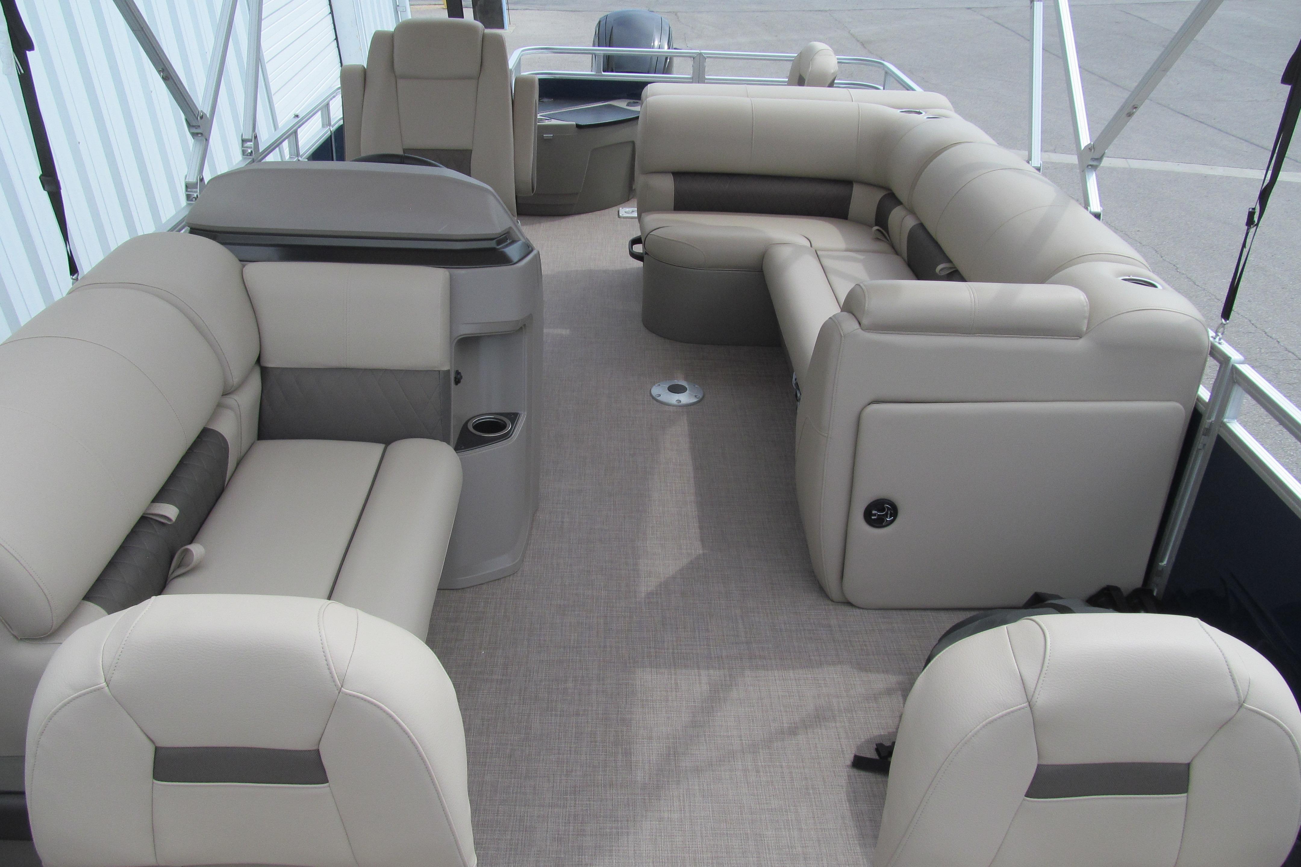 2024 Sun Tracker Fishin' Barge 20 DLX interior with spacious seating and modern design.