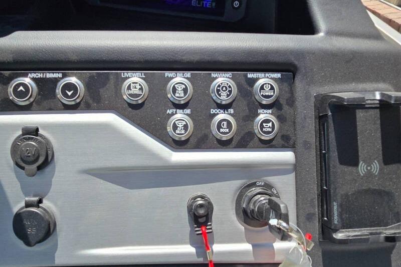 Control panel of a 2026 Berkshire STS Arch Performance Series boat with various function buttons.