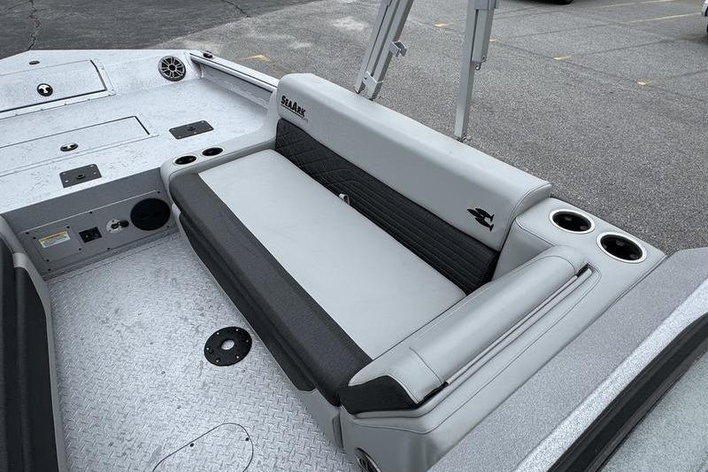 2025 SeaArk Super Lounge Easy boat interior with gray seating and cup holders.