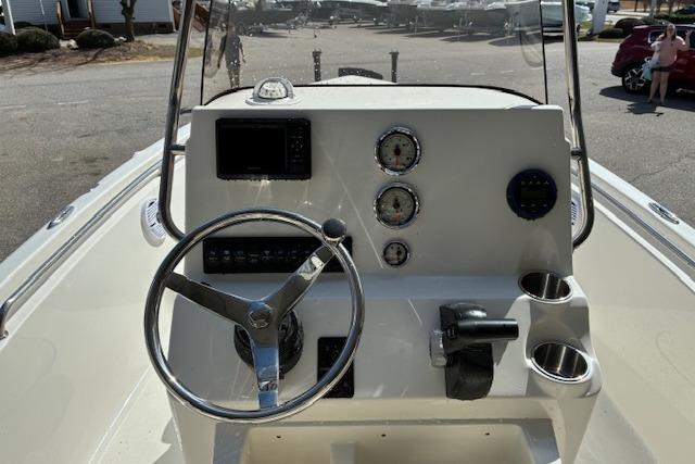 2026 Key West 189 FS boat console with steering wheel and gauges.