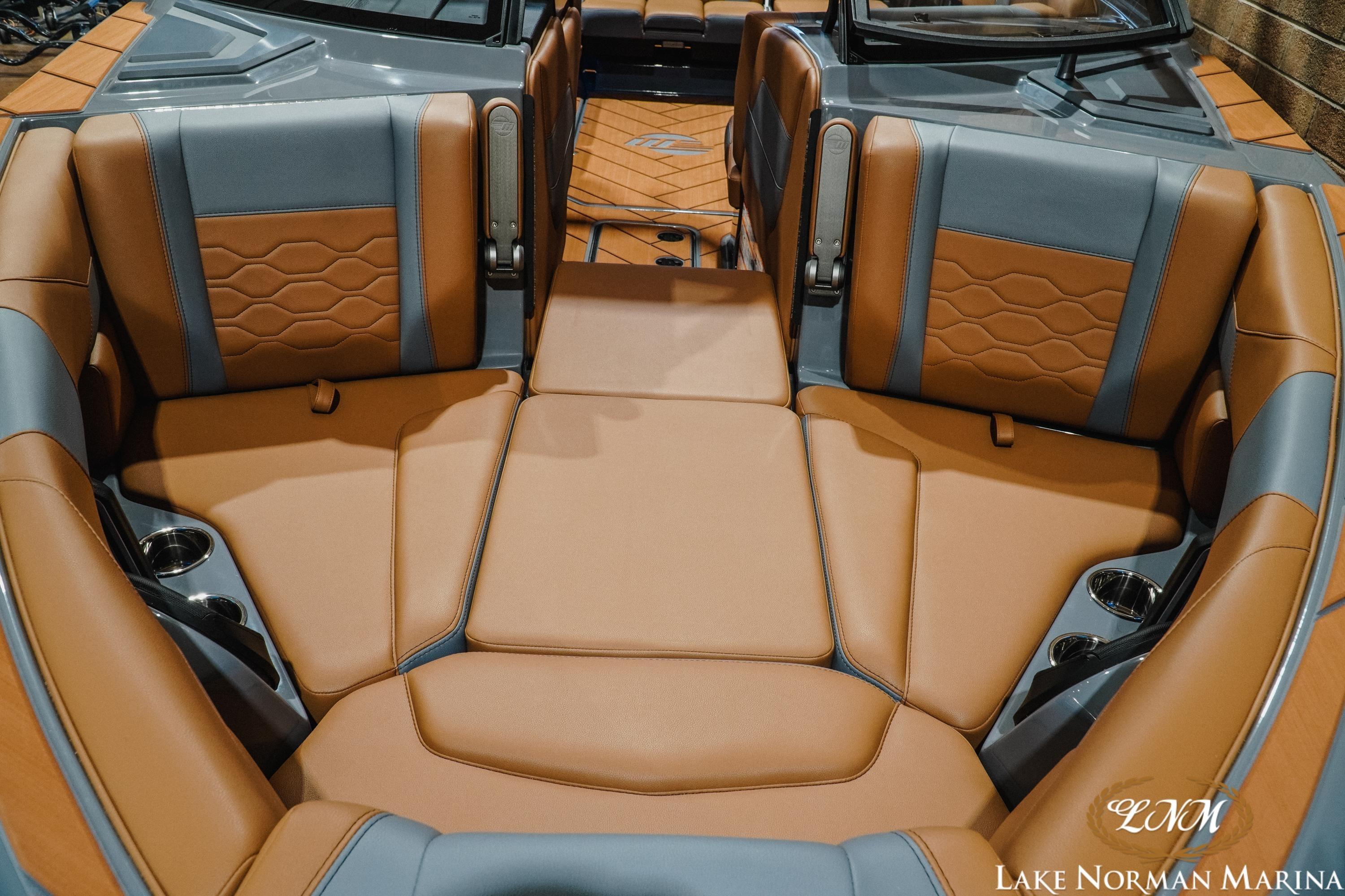 2026 Malibu Wakesetter 23 LSV interior with luxurious brown and gray seating.