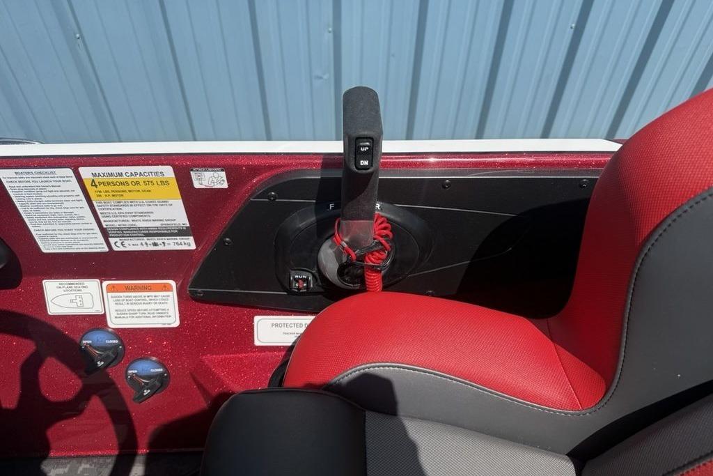 2026 Nitro Z20 XL Pro boat cockpit with red seat and control panel.