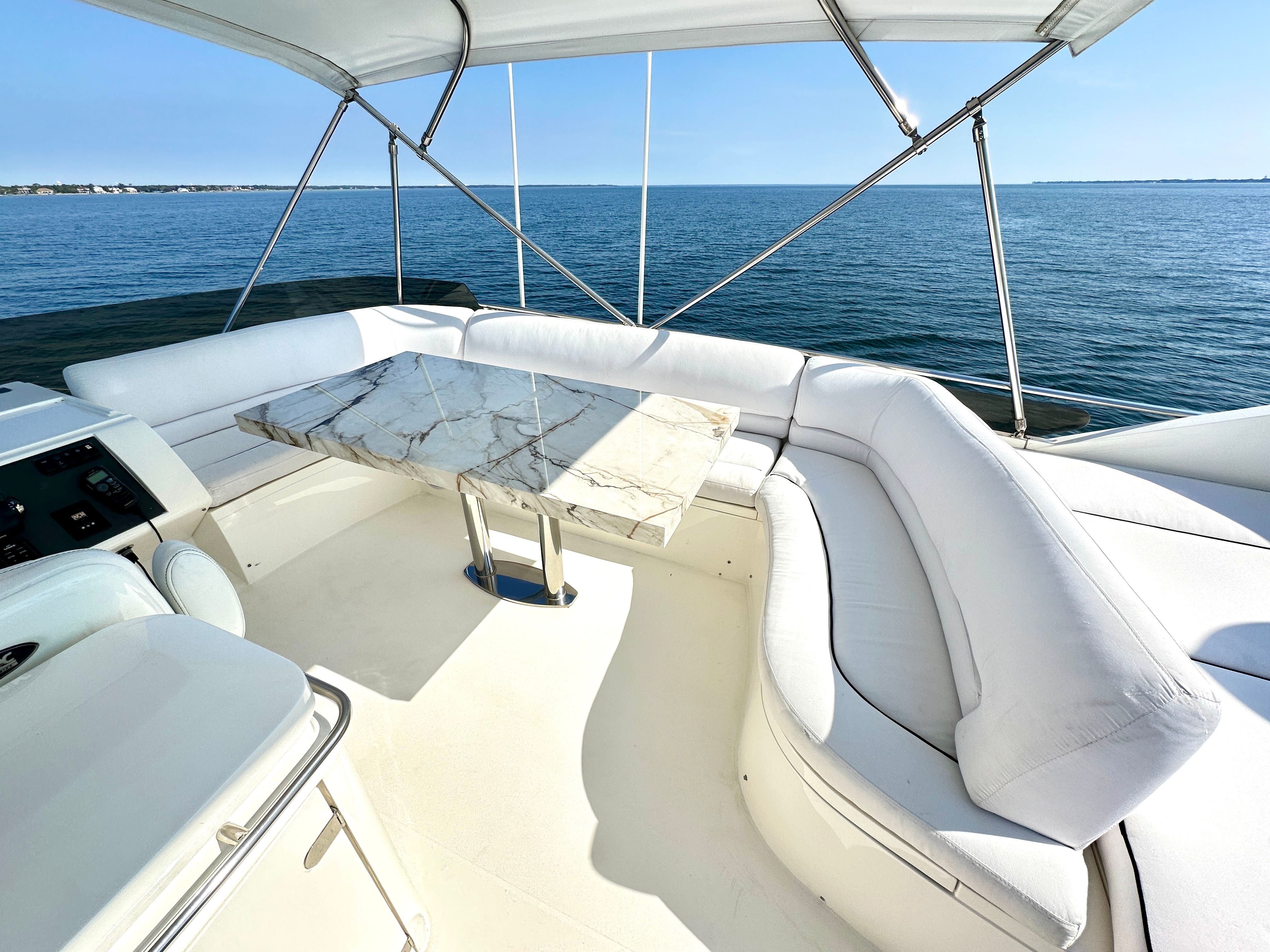 Viking Princess F54 Flybridge 2009 with marble table and ocean view.