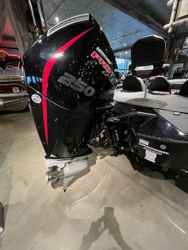 2025 Tracker Savage 215 boat with powerful 250 HP engine in showroom.