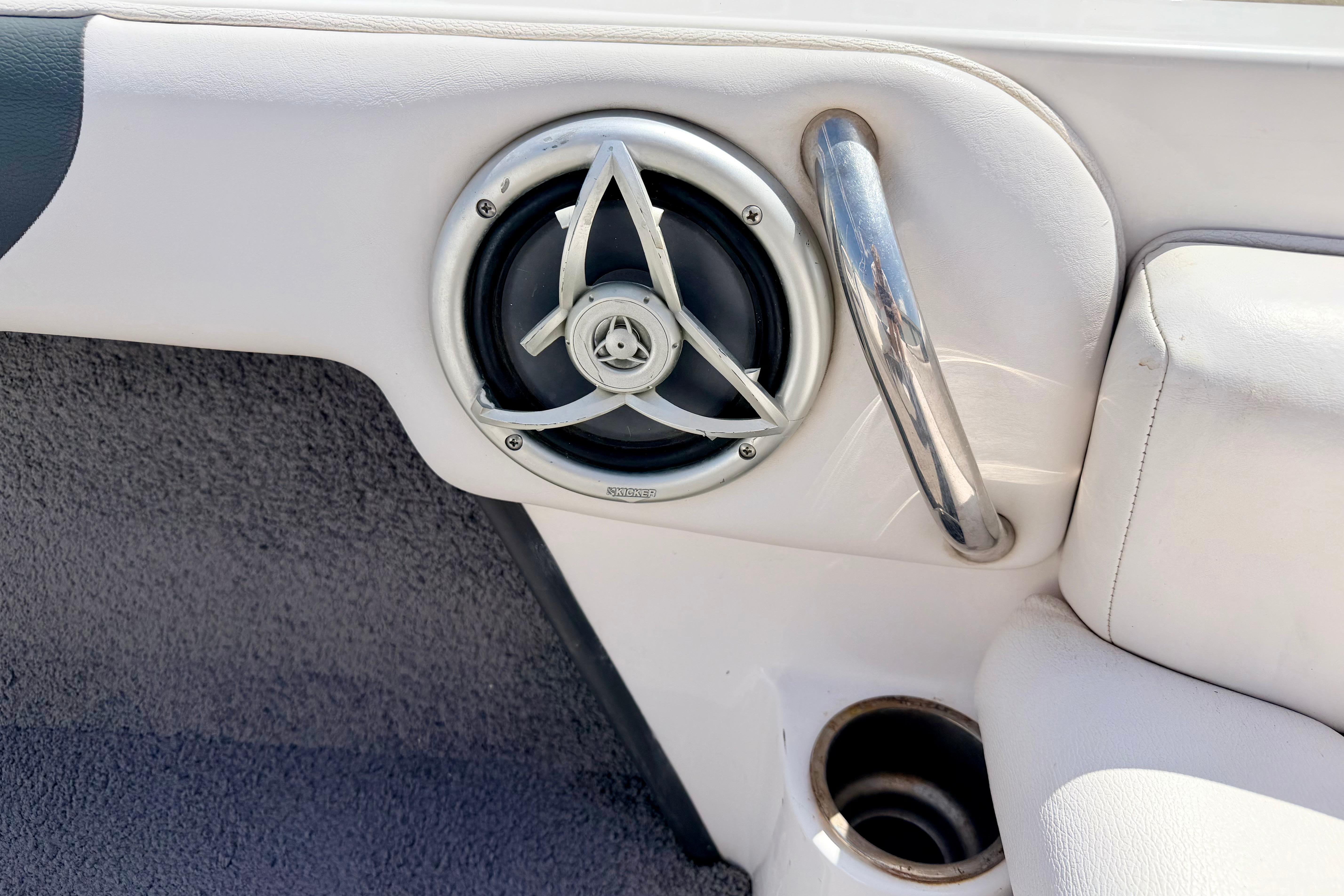 2008 Moomba Outback V boat interior with speaker and stainless steel handle.