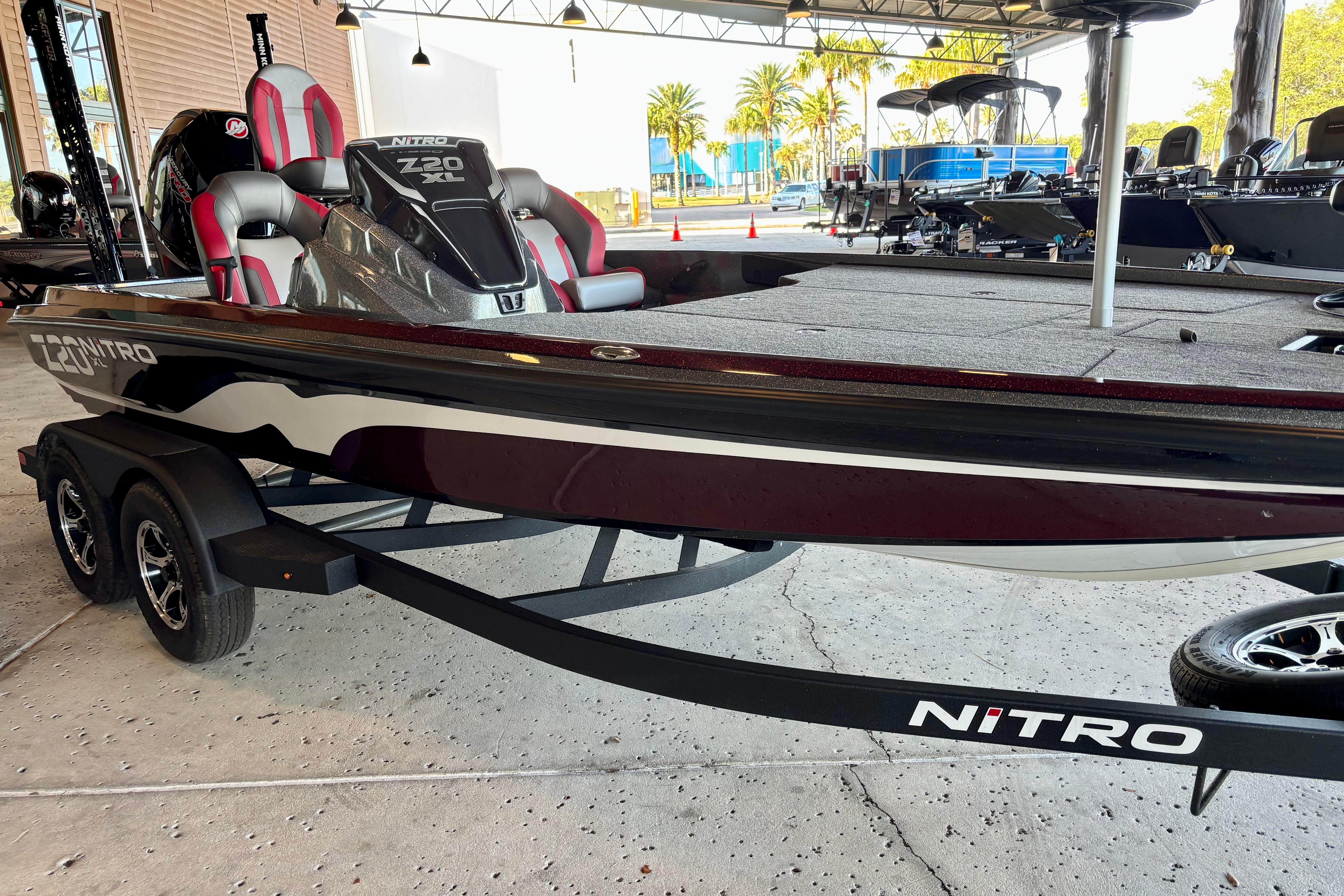 2026 Nitro Z20 XL Pro bass boat on trailer in showroom setting.