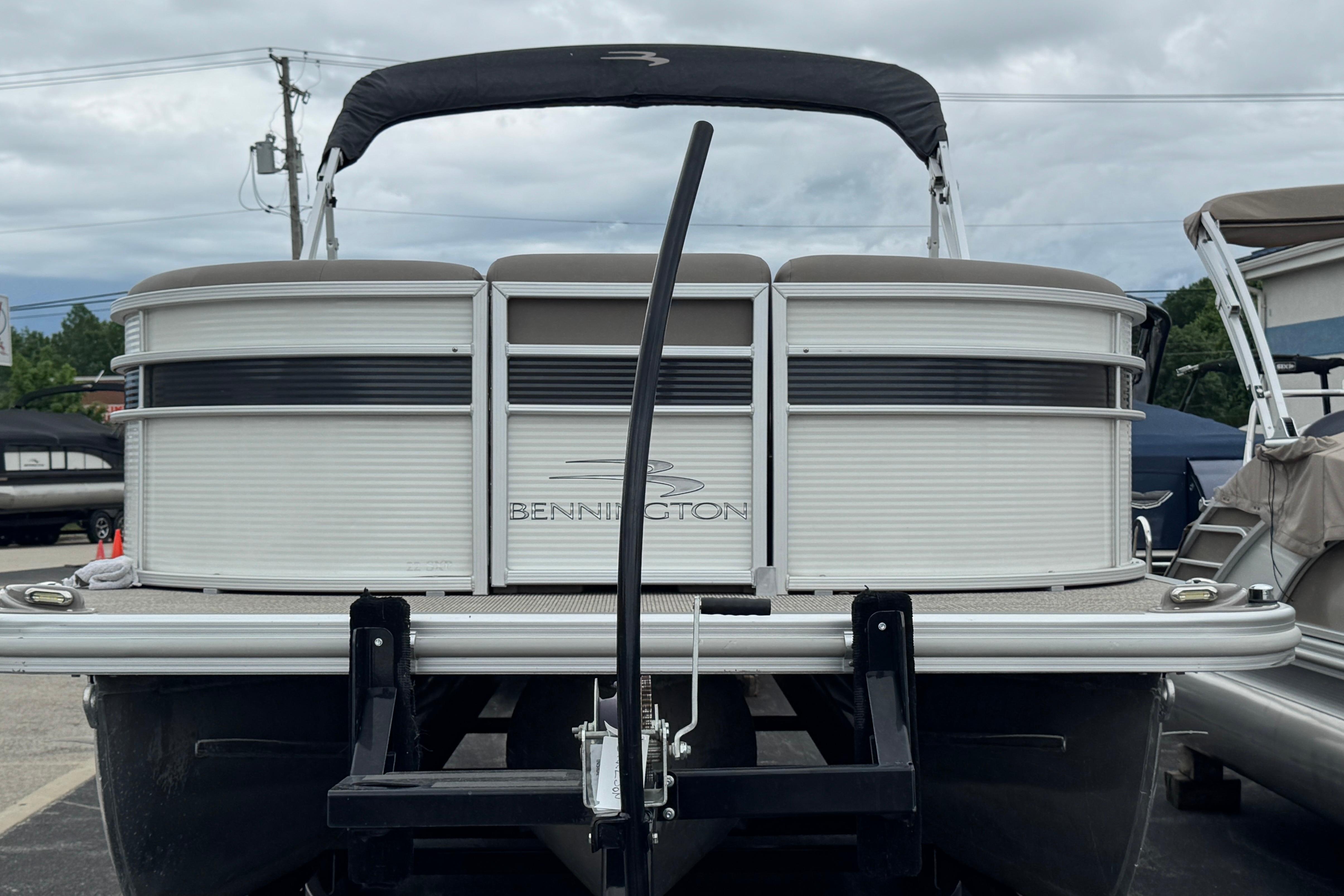 2019 Bennington SX 22 SSBXP pontoon boat on trailer, rear view.