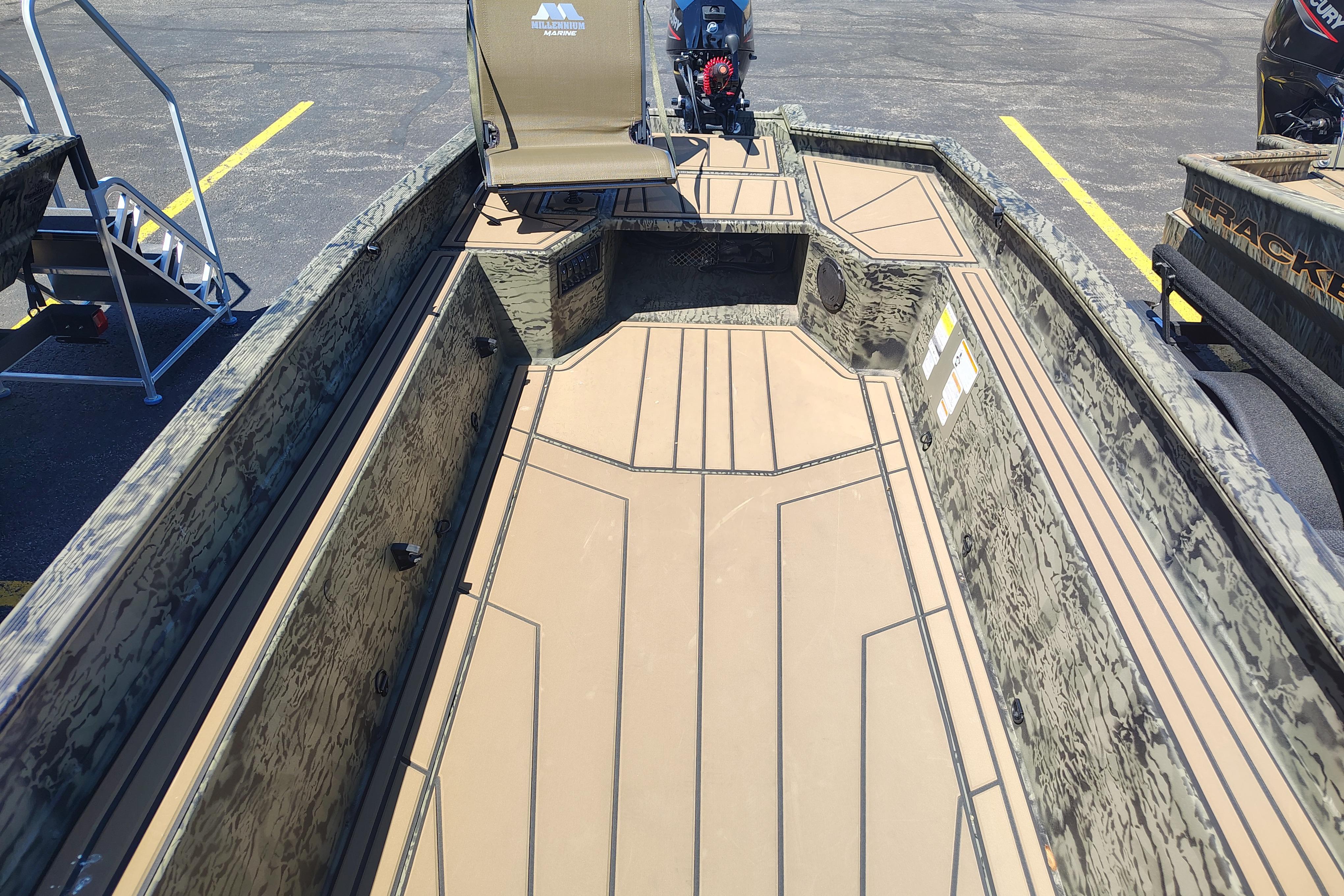 2026 Tracker Grizzly 1650 T Prairie Wings Edition boat interior with camouflage design.
