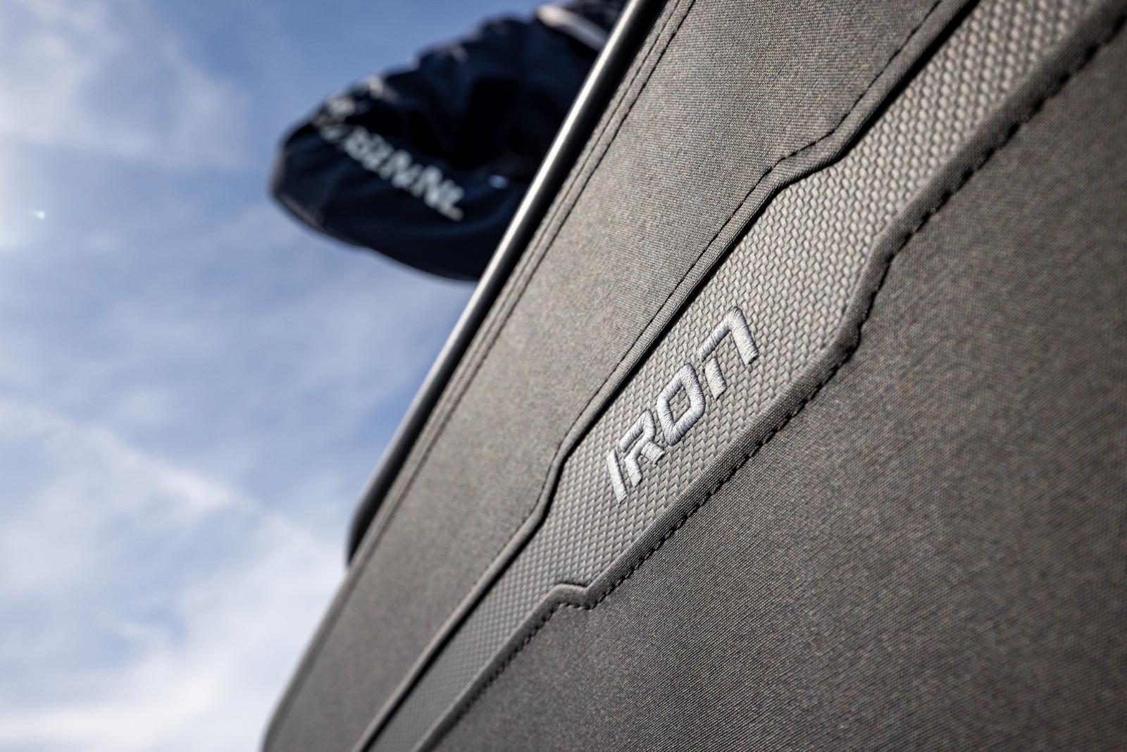 Close-up of Iron 707 logo on textured surface, 2022 model.