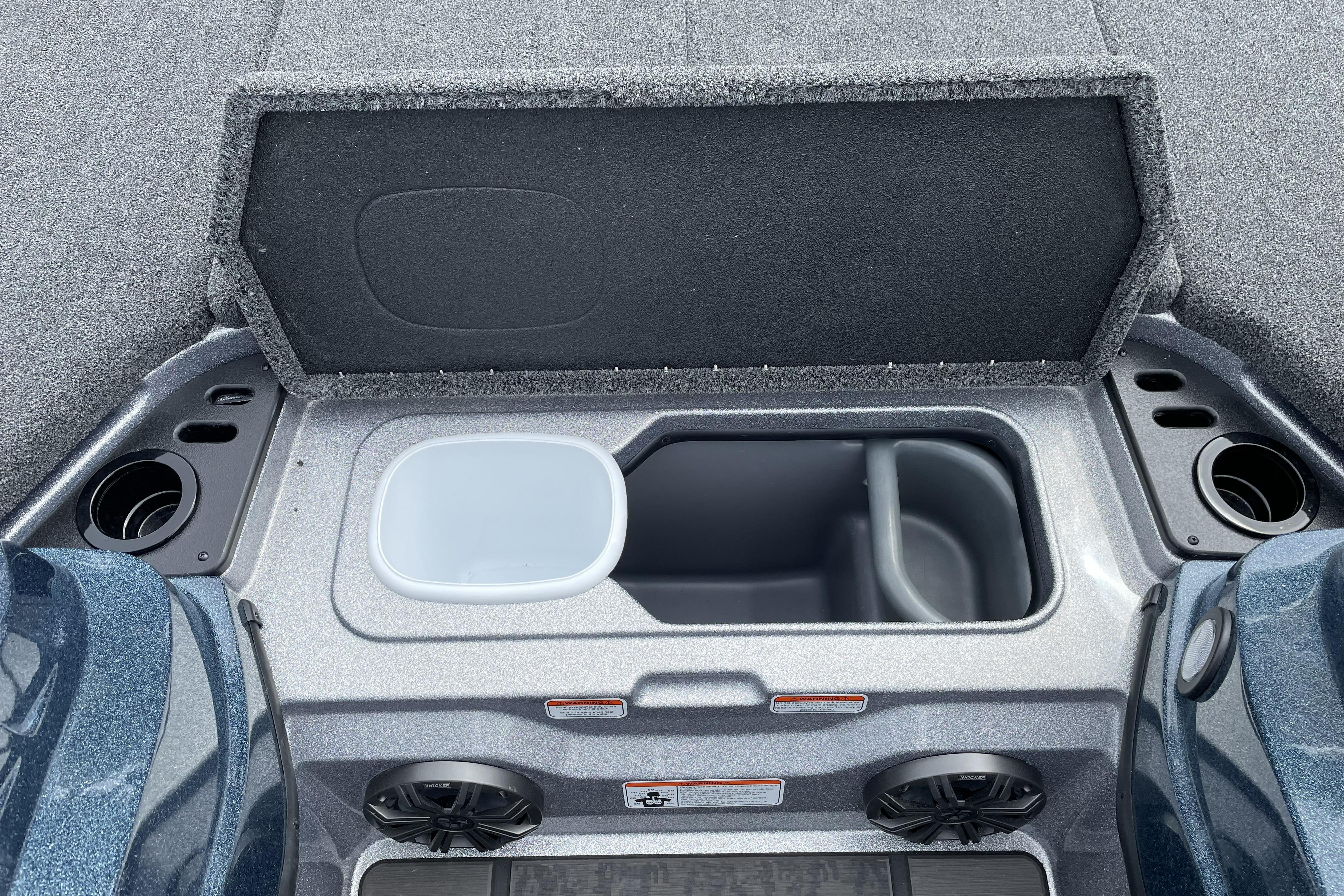 Open storage compartment in a 2026 Nitro Z21 XL boat.
