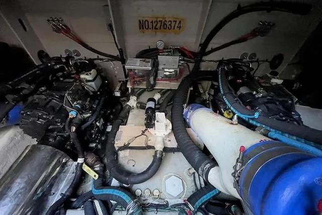 Engine room of 2016 Sea Ray Sundancer 510 with visible components and wiring.