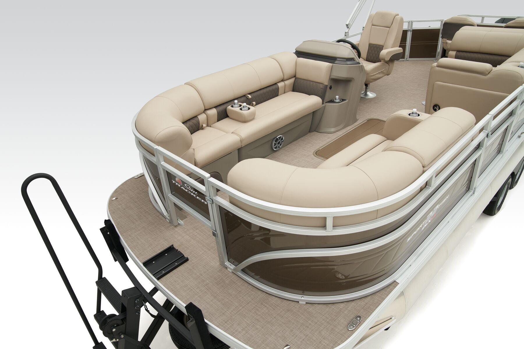 2023 Sun Tracker SportFish 22 XP3 pontoon boat with spacious seating and modern design.
