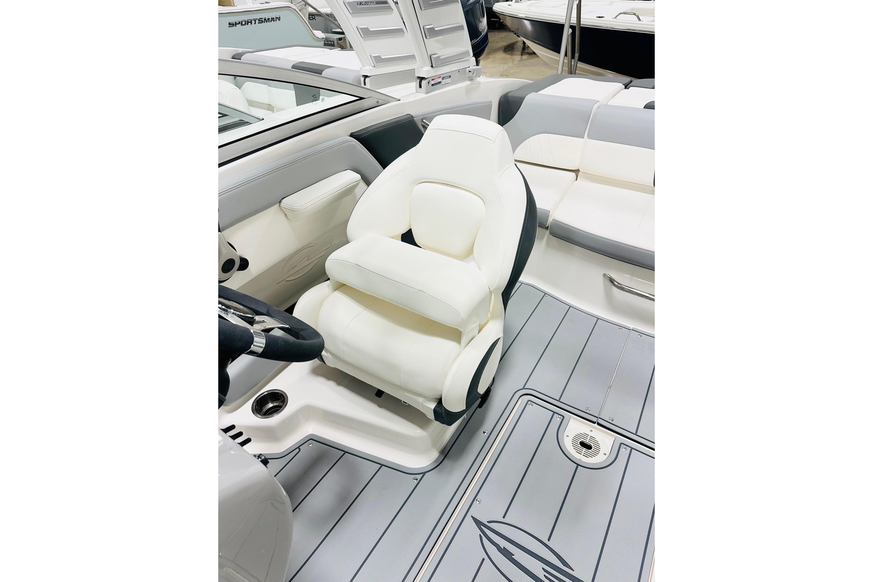 2025 Chaparral 21 SSi OB boat interior with white seating and sleek design.
