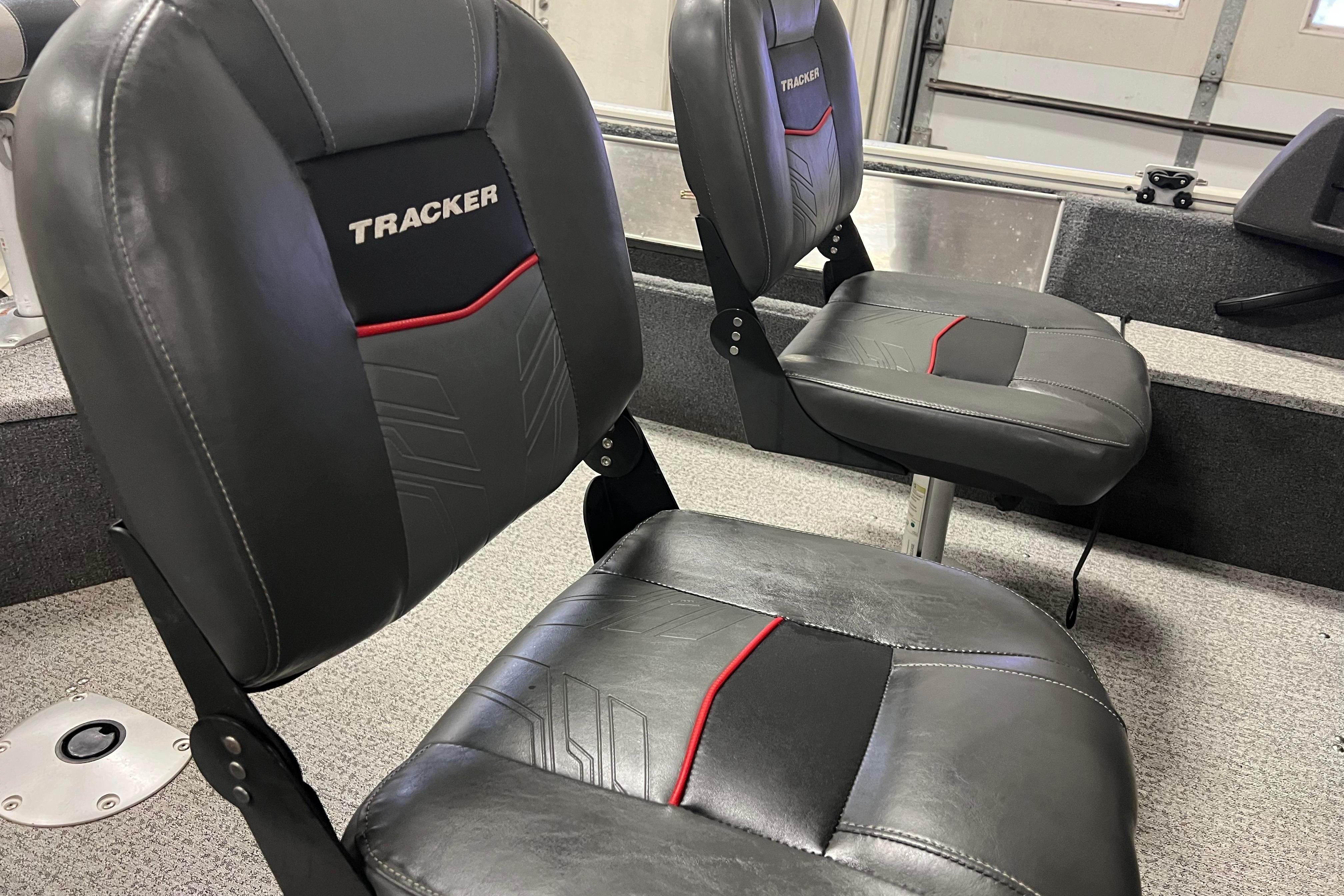 2022 Tracker Pro Guide V-16 WT boat seats with black and red design.