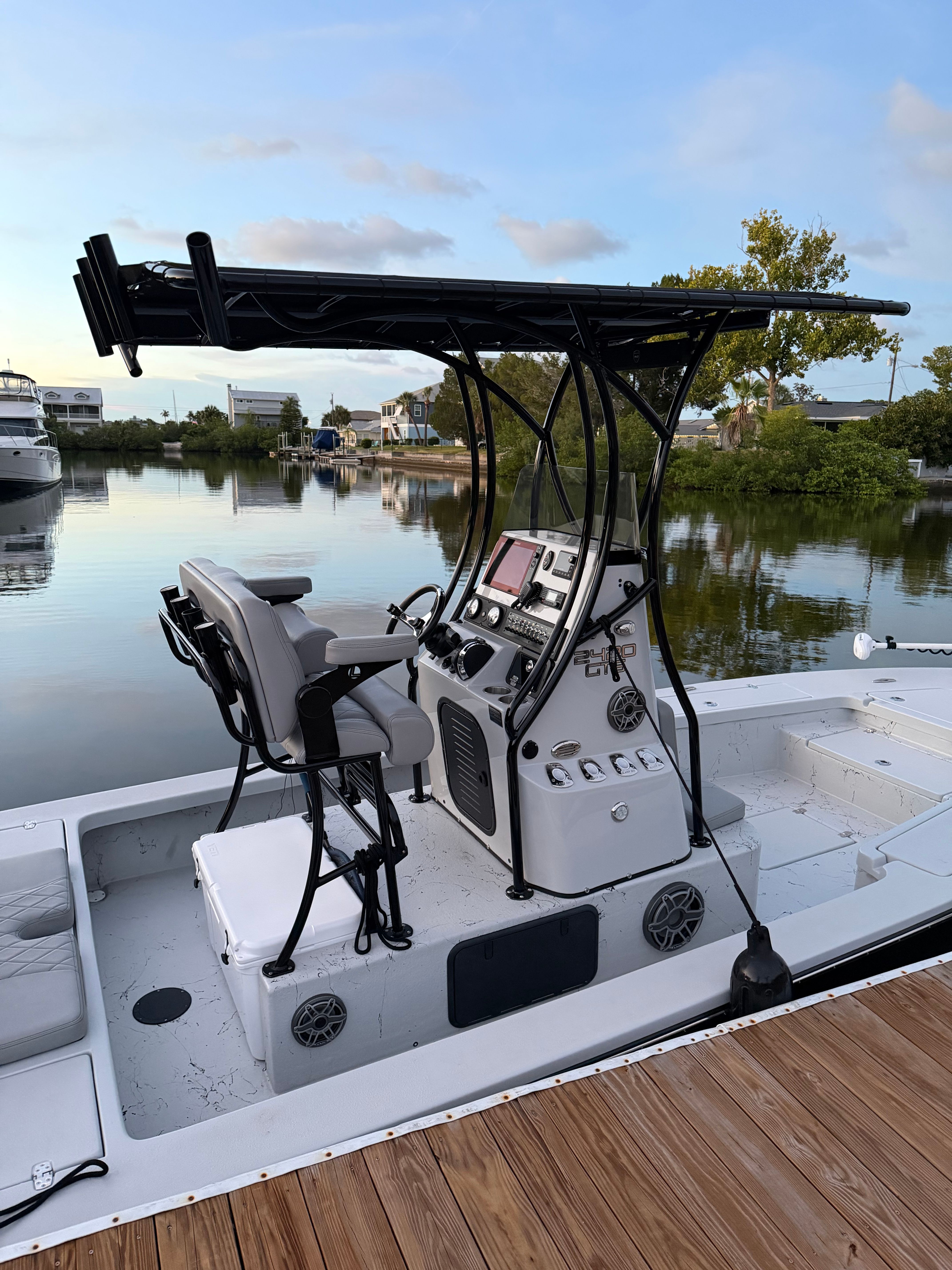 A 2022 Blazer Bay 2420 GTS with a modern helm and sleek white design.