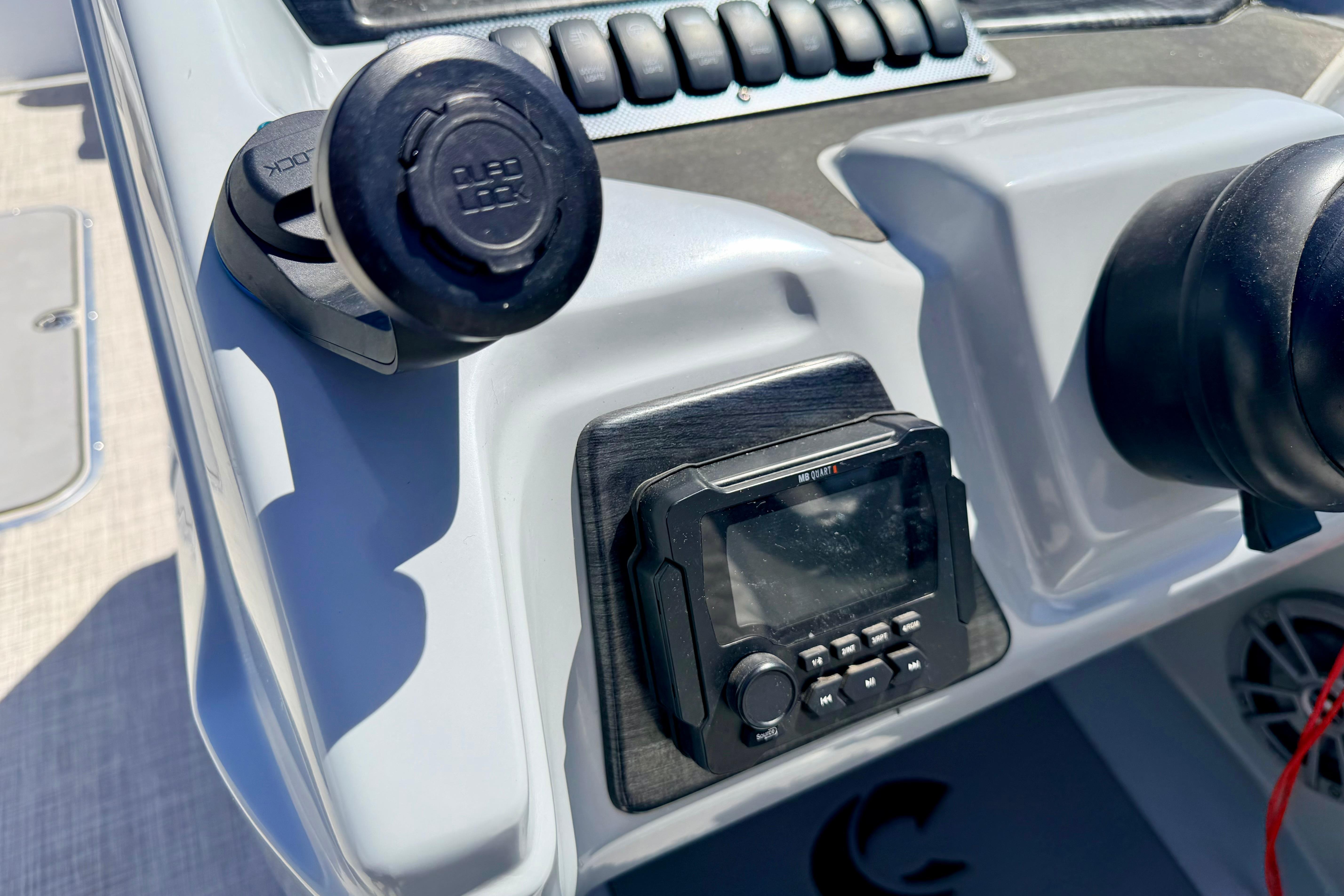 Control panel of 2019 Crestliner 240 Rally DX CW boat with audio system and controls.