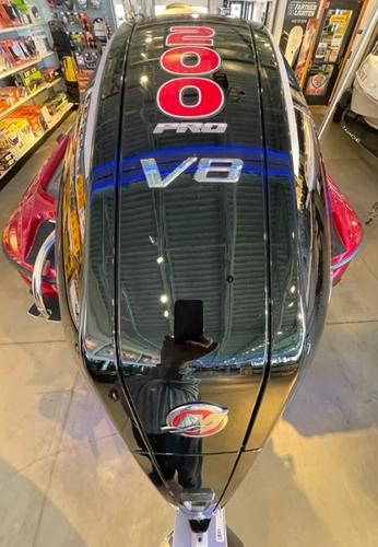 2025 Nitro Z19 V8 engine in showroom, showcasing 200 Pro model.