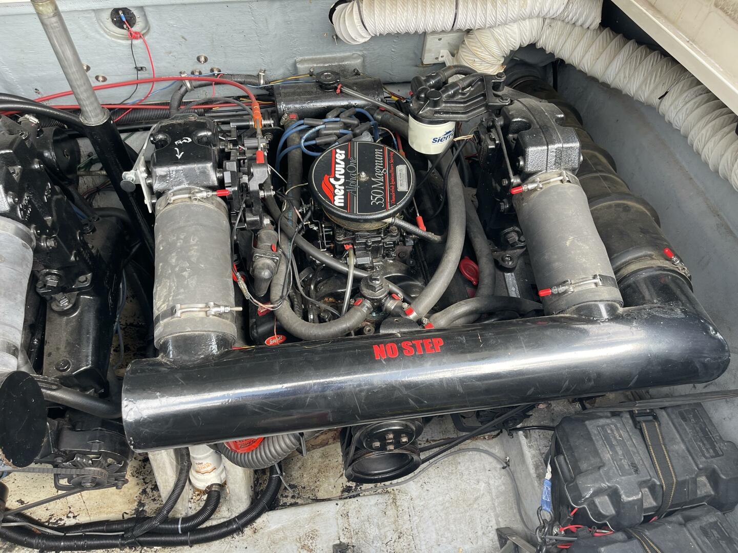 Engine compartment of a 1987 Sea Ray PACHANGA boat, featuring a MerCruiser engine.
