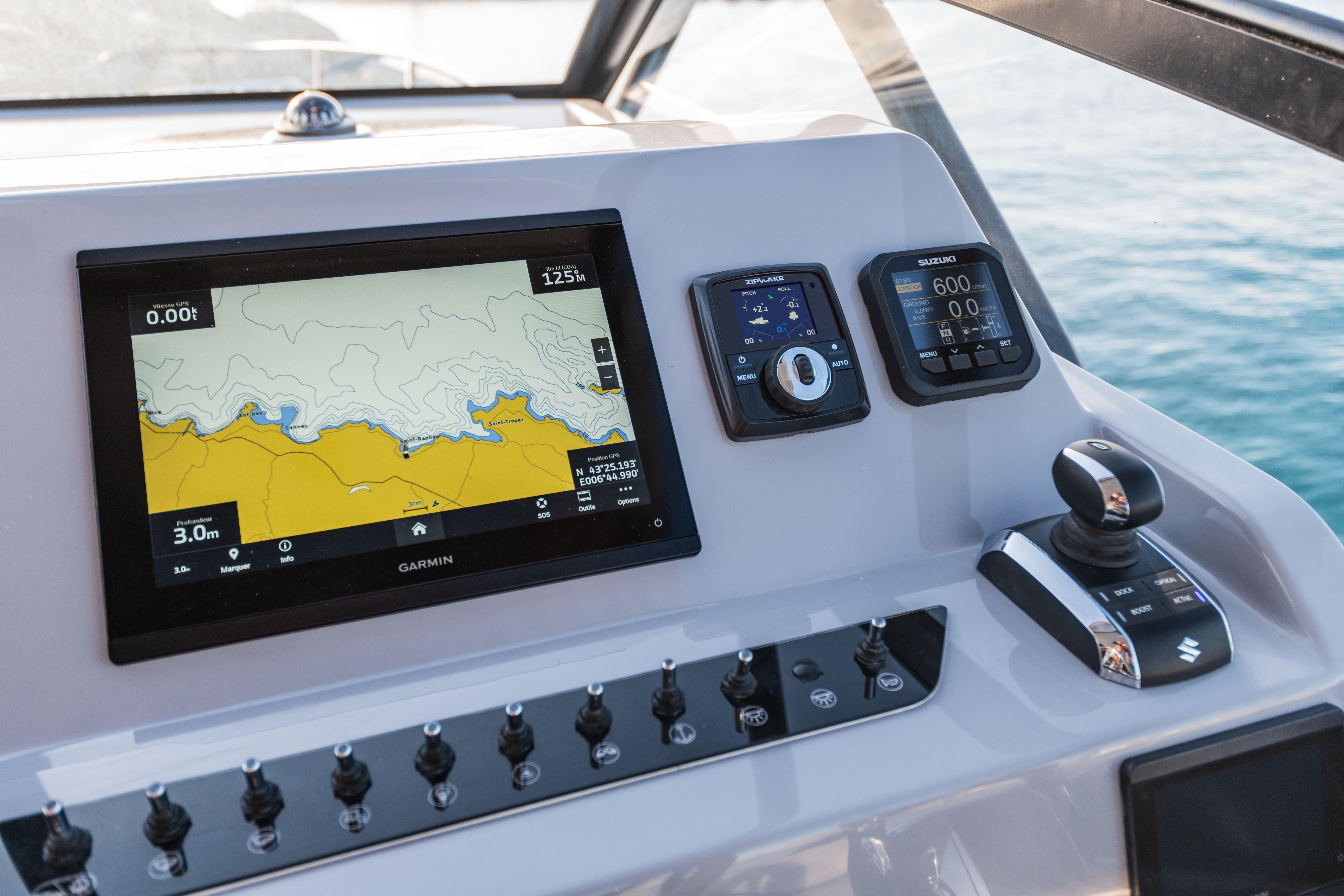 Control panel of 2026 Beneteau Flyer 10 with Garmin navigation display.