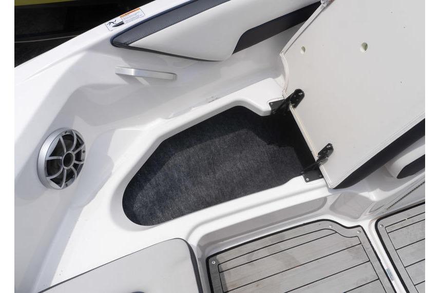 2021 Yamaha Boats 195S storage compartment with open hatch and speaker detail.