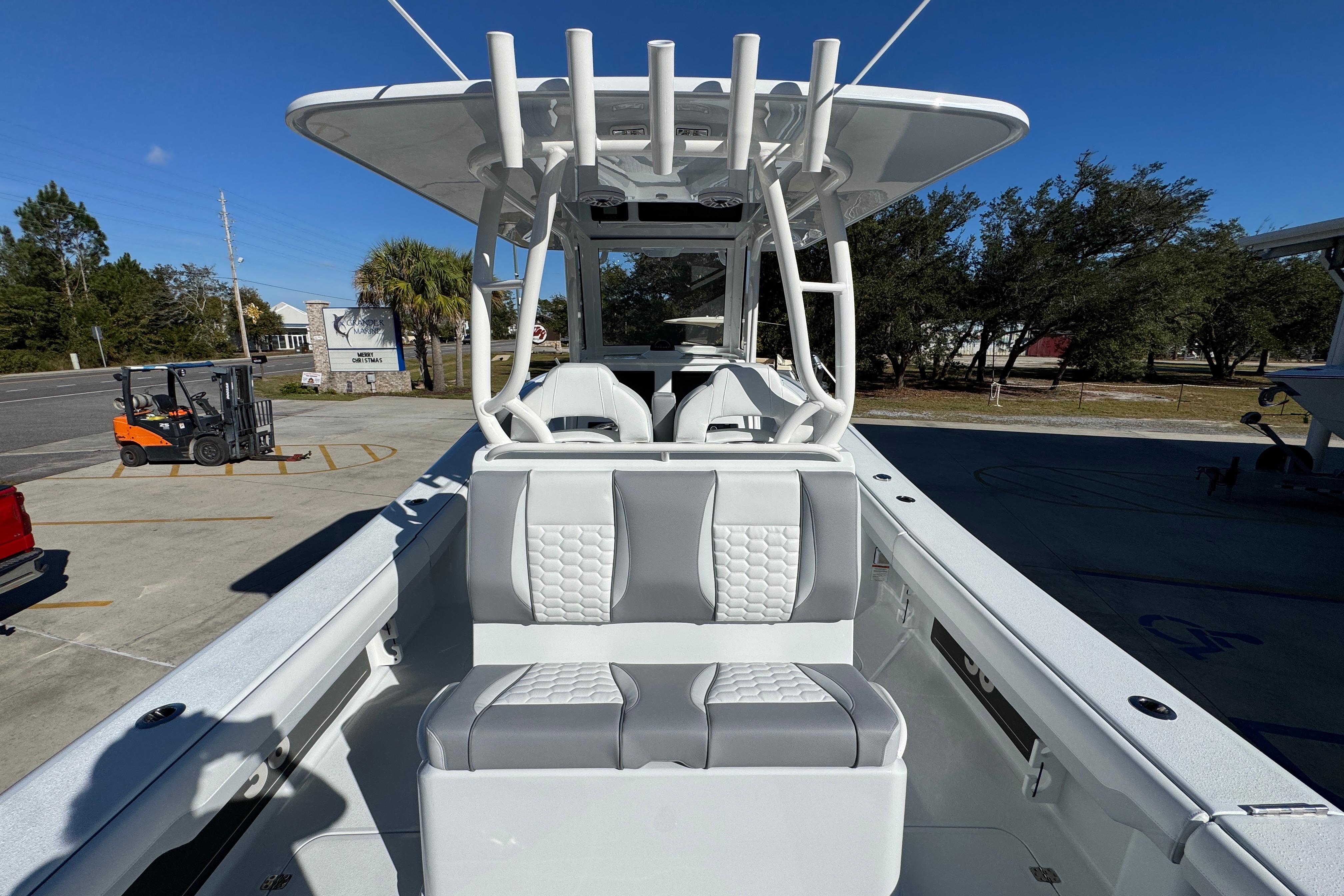 2026 Yellowfin 36 Offshore boat interior with modern seating and T-top design.