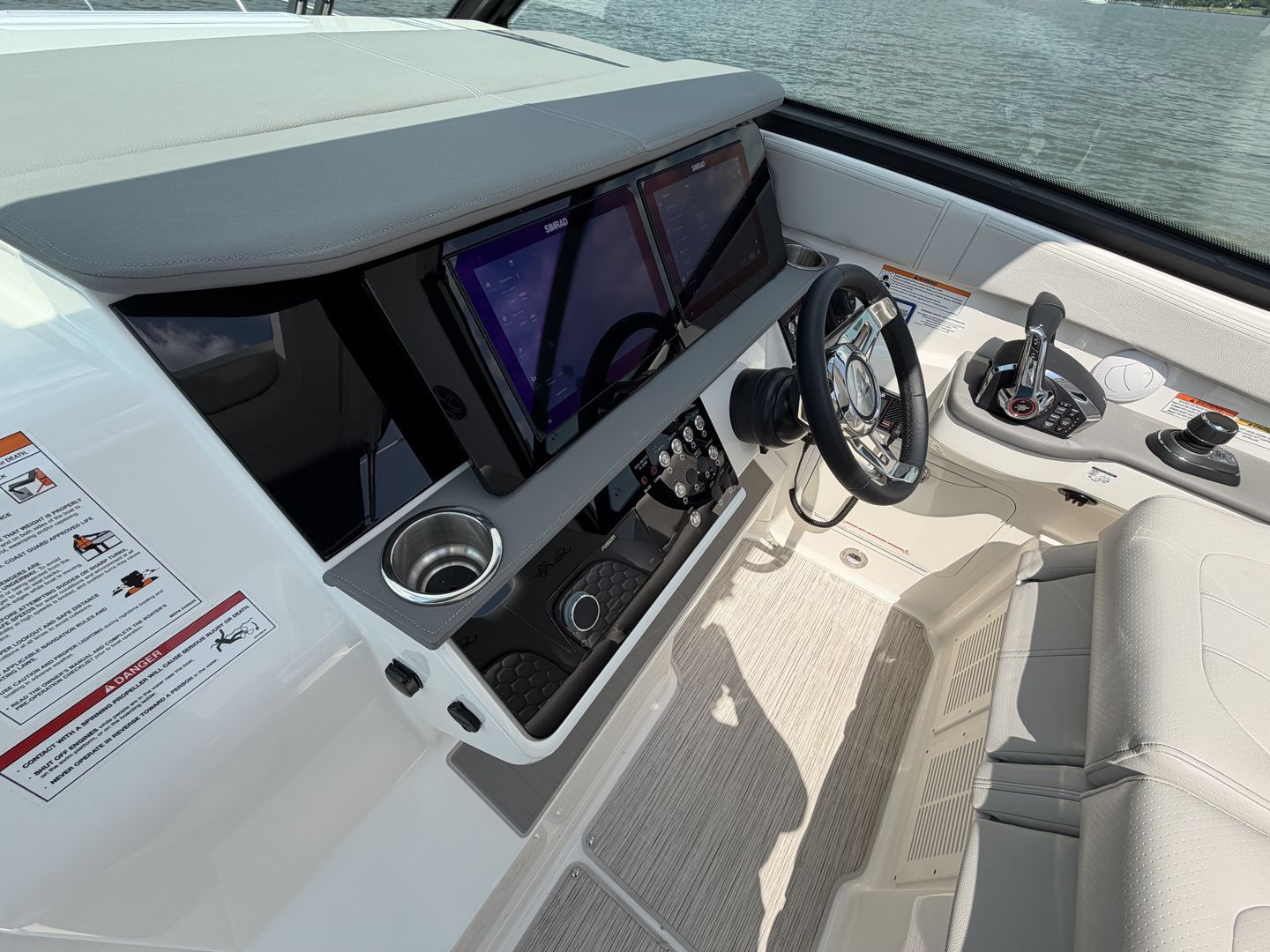 Interior view of Sea Ray Sundancer 320 Outboard 2026 cockpit.