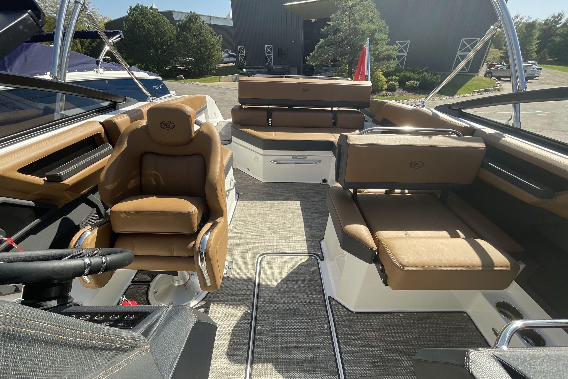 2025 Cobalt R4 boat interior with luxurious tan seating and modern design.